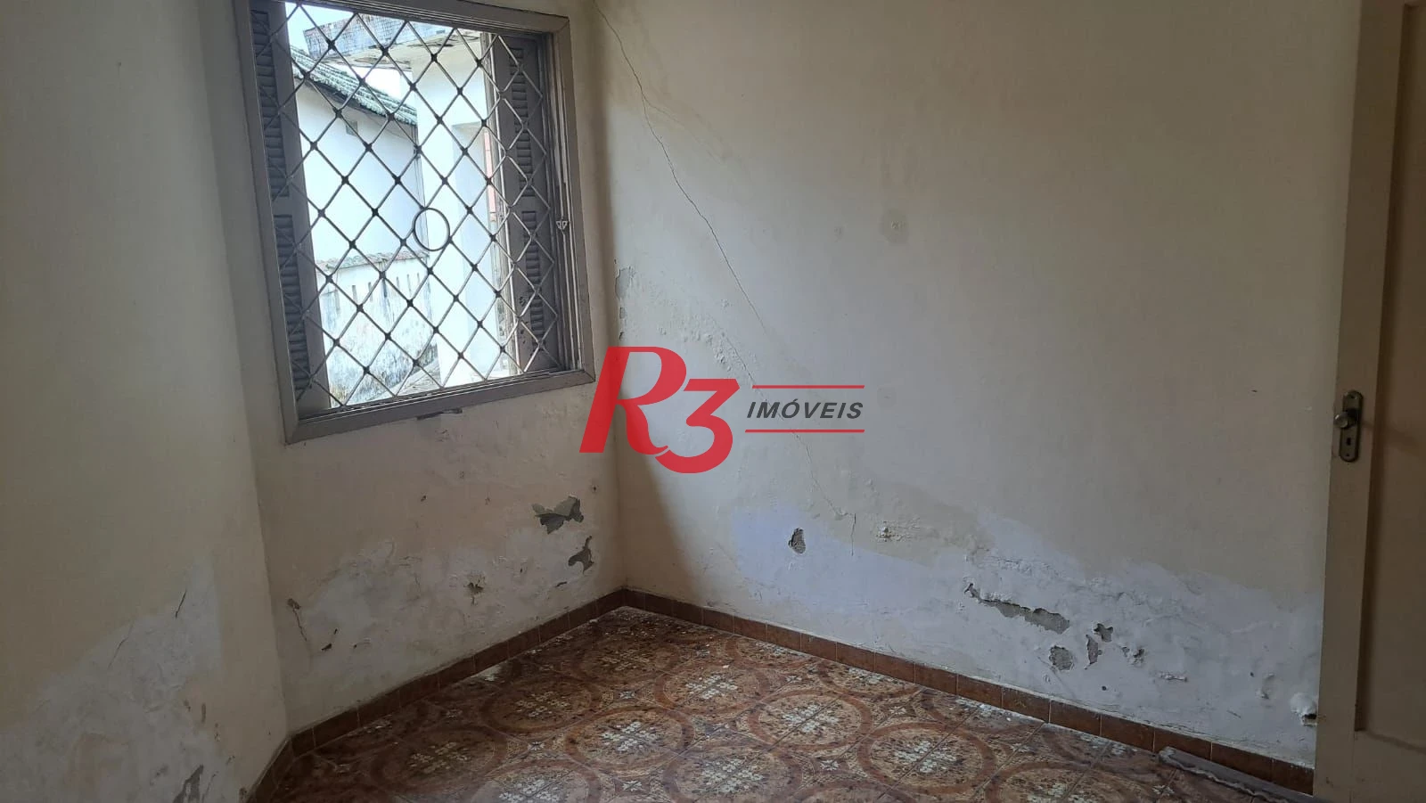 Casa com 3 dormitórios à venda, 131 m² por R$ 600.000,00 - Aparecida - Santos/SP