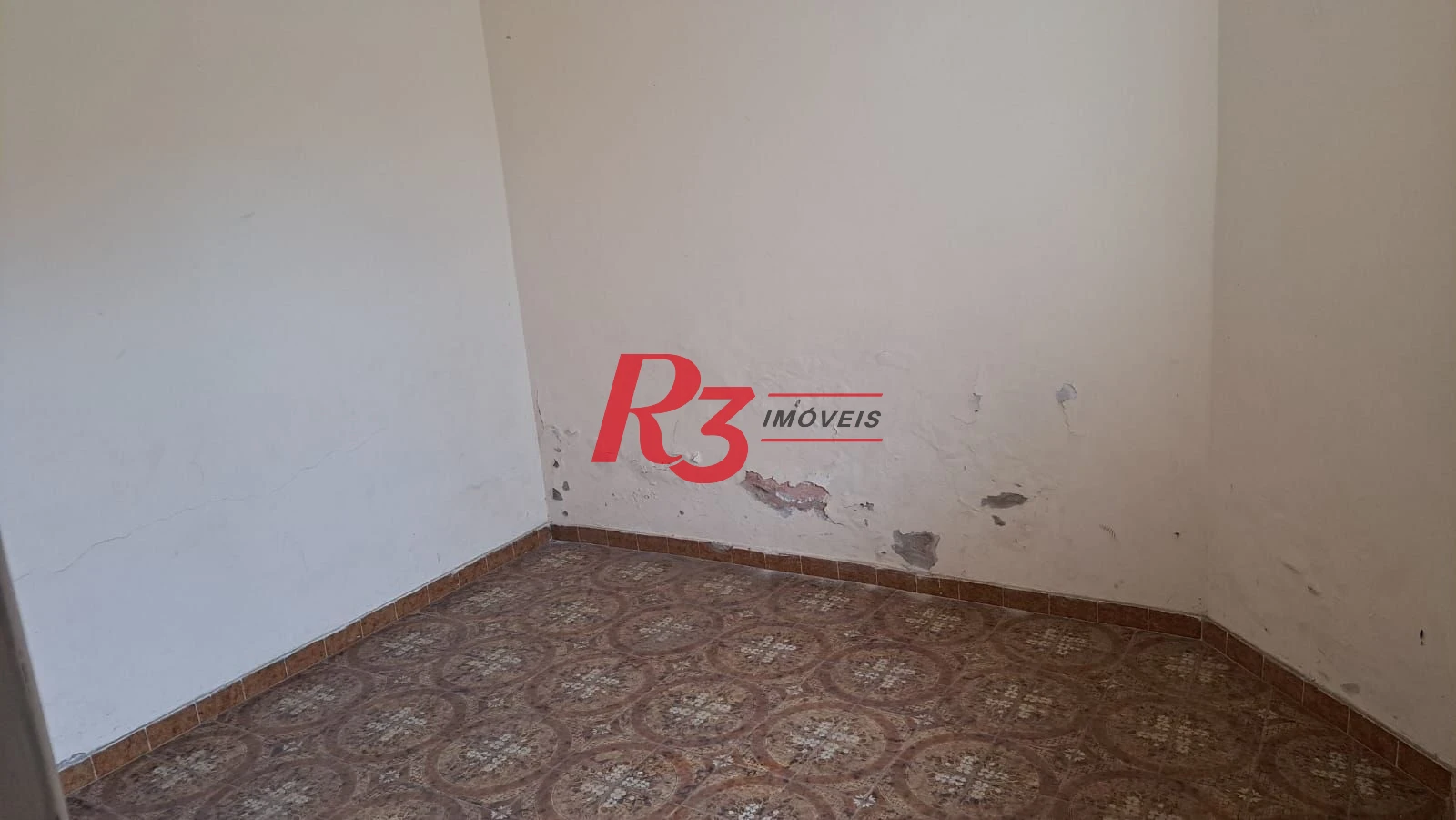 Casa com 3 dormitórios à venda, 131 m² por R$ 600.000,00 - Aparecida - Santos/SP