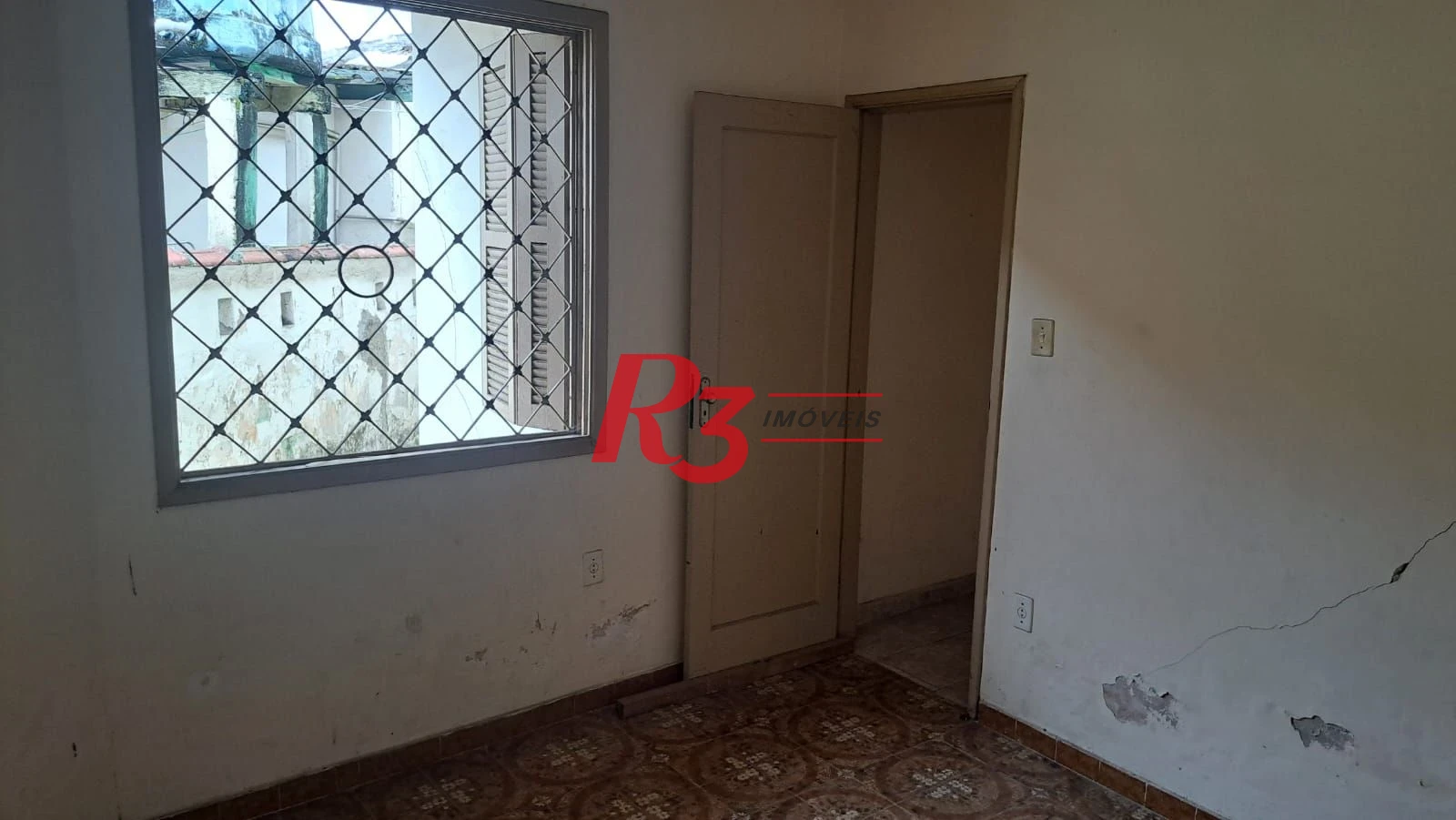 Casa com 3 dormitórios à venda, 131 m² por R$ 600.000,00 - Aparecida - Santos/SP
