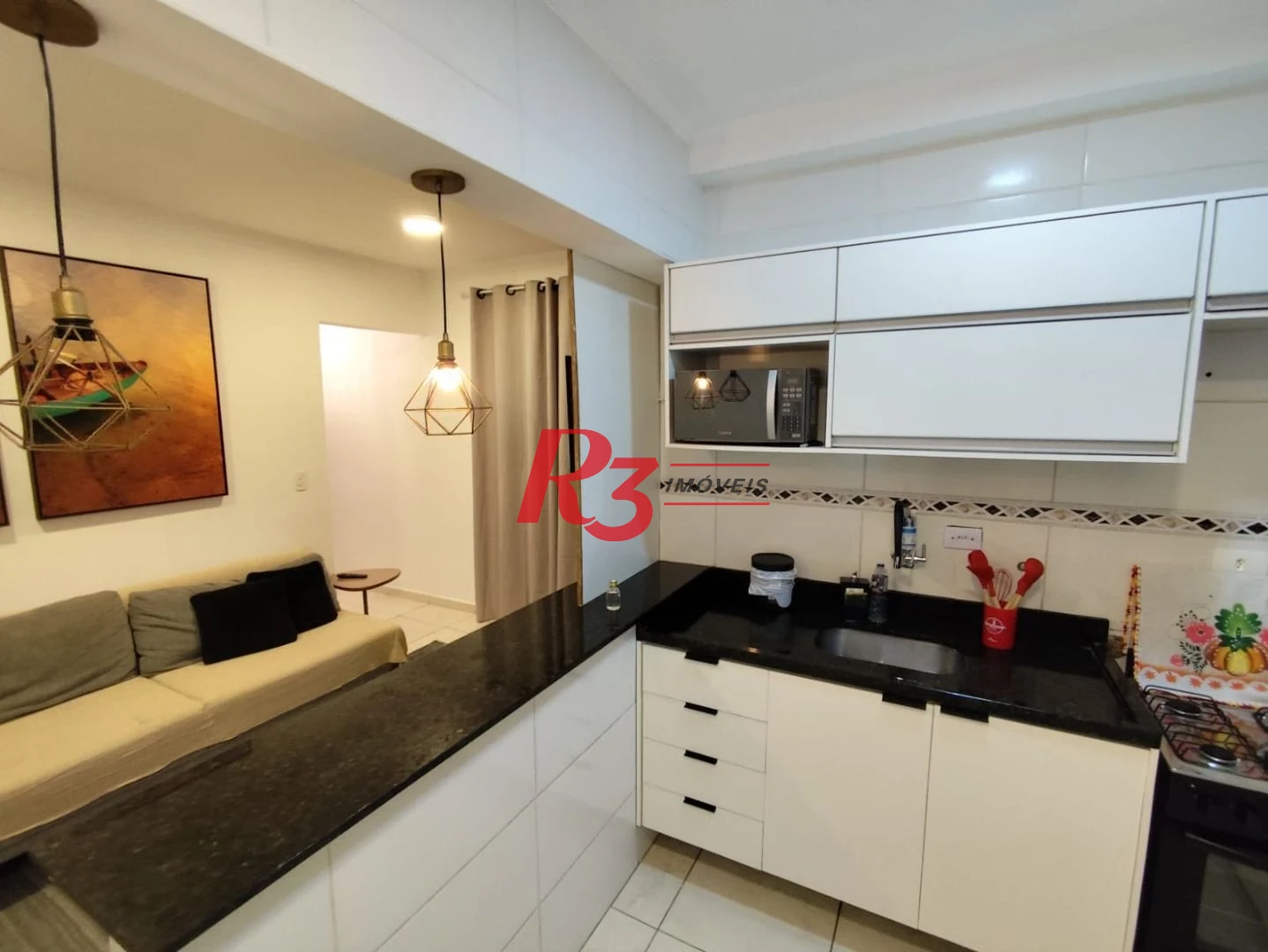 Apartamento com 2 dormitórios para alugar, 59 m² por R$ 3.200,00/mês - Vila Voturuá - São Vicente/SP