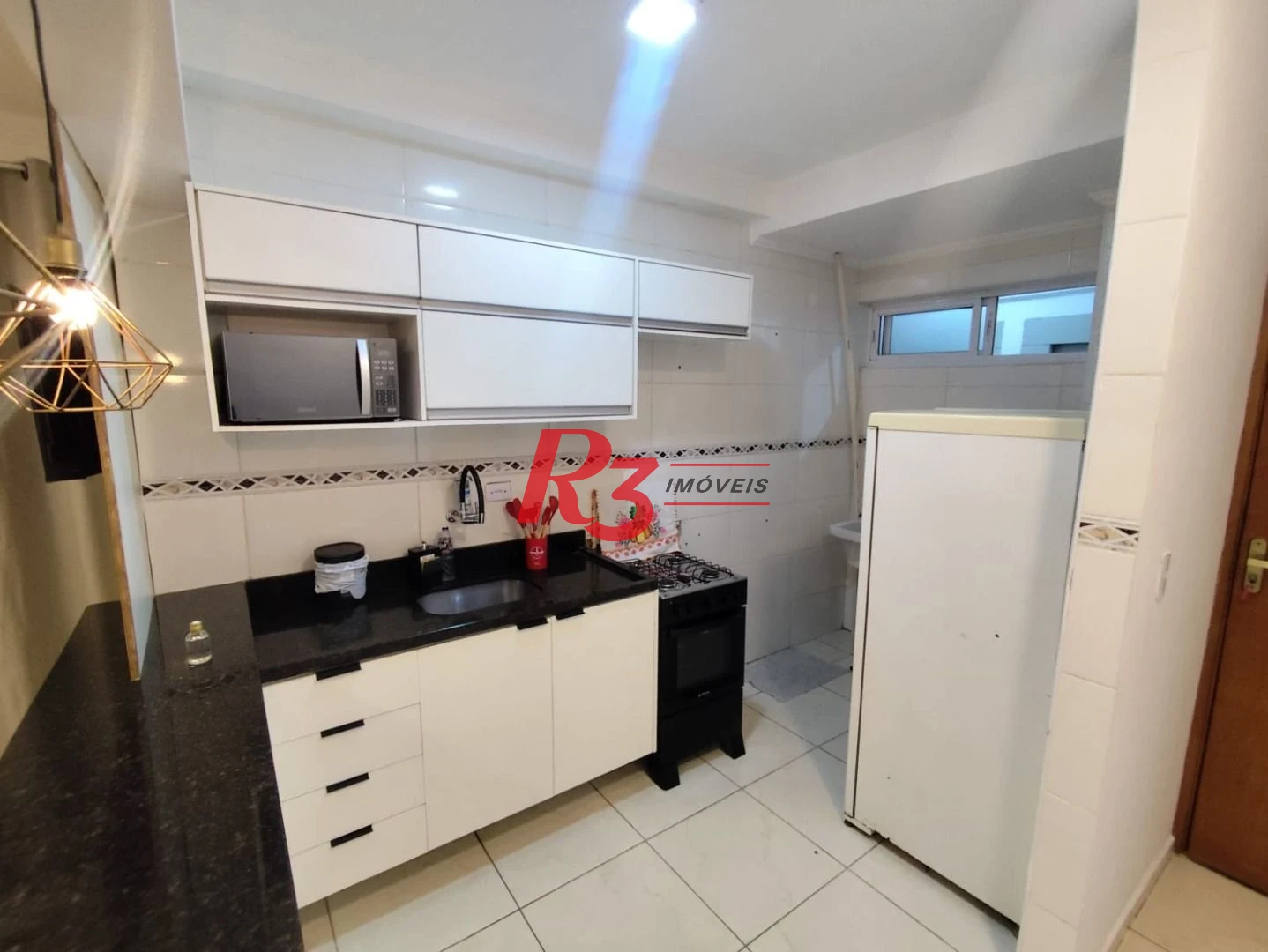 Apartamento com 2 dormitórios para alugar, 59 m² por R$ 3.200,00/mês - Vila Voturuá - São Vicente/SP