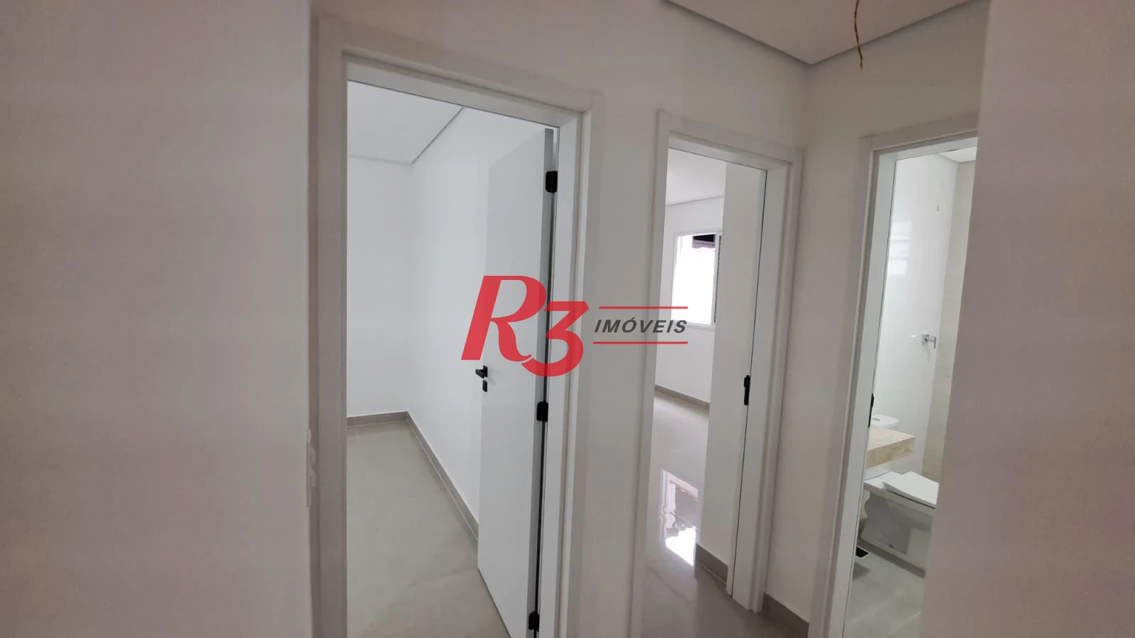 Casa com 3 dormitórios à venda, 139 m² por R$ 1.400.000,00 - Aparecida - Santos/SP