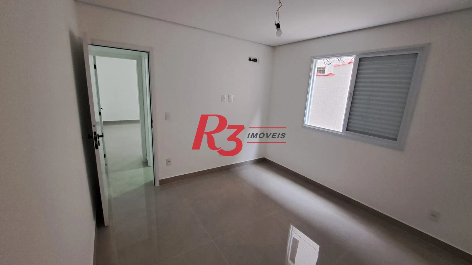Casa com 3 dormitórios à venda, 139 m² por R$ 1.400.000,00 - Aparecida - Santos/SP