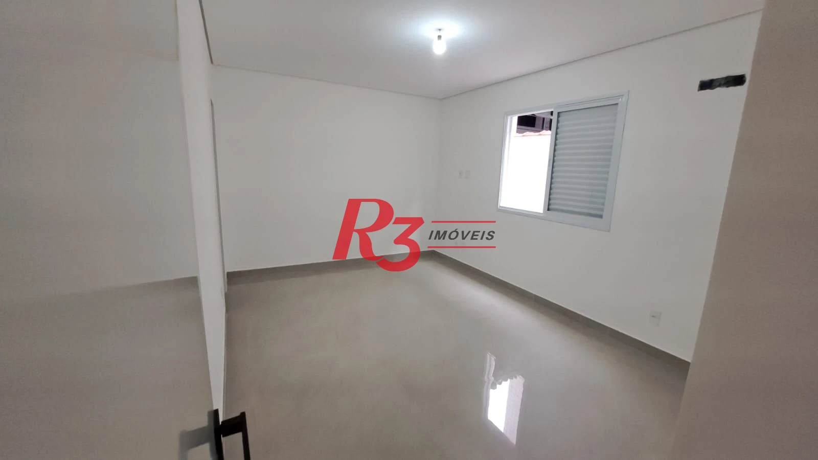 Casa com 3 dormitórios à venda, 139 m² por R$ 1.400.000,00 - Aparecida - Santos/SP