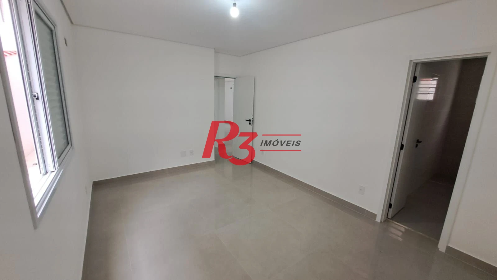 Casa com 3 dormitórios à venda, 139 m² por R$ 1.400.000,00 - Aparecida - Santos/SP