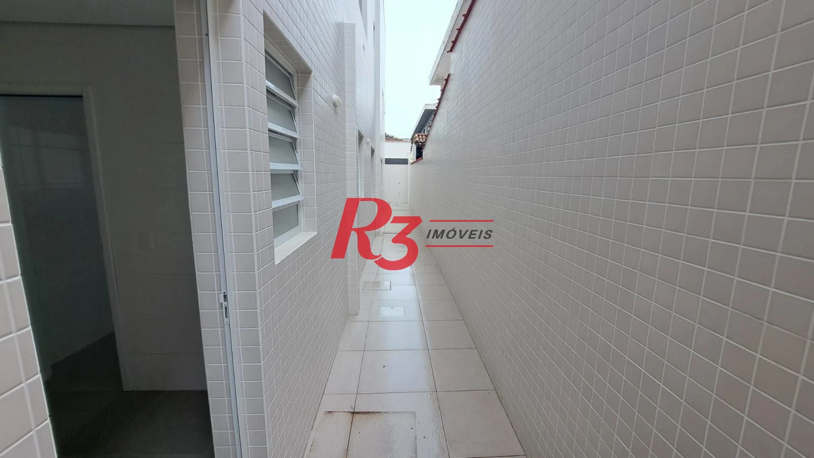 Casa com 3 dormitórios à venda, 139 m² por R$ 1.400.000,00 - Aparecida - Santos/SP