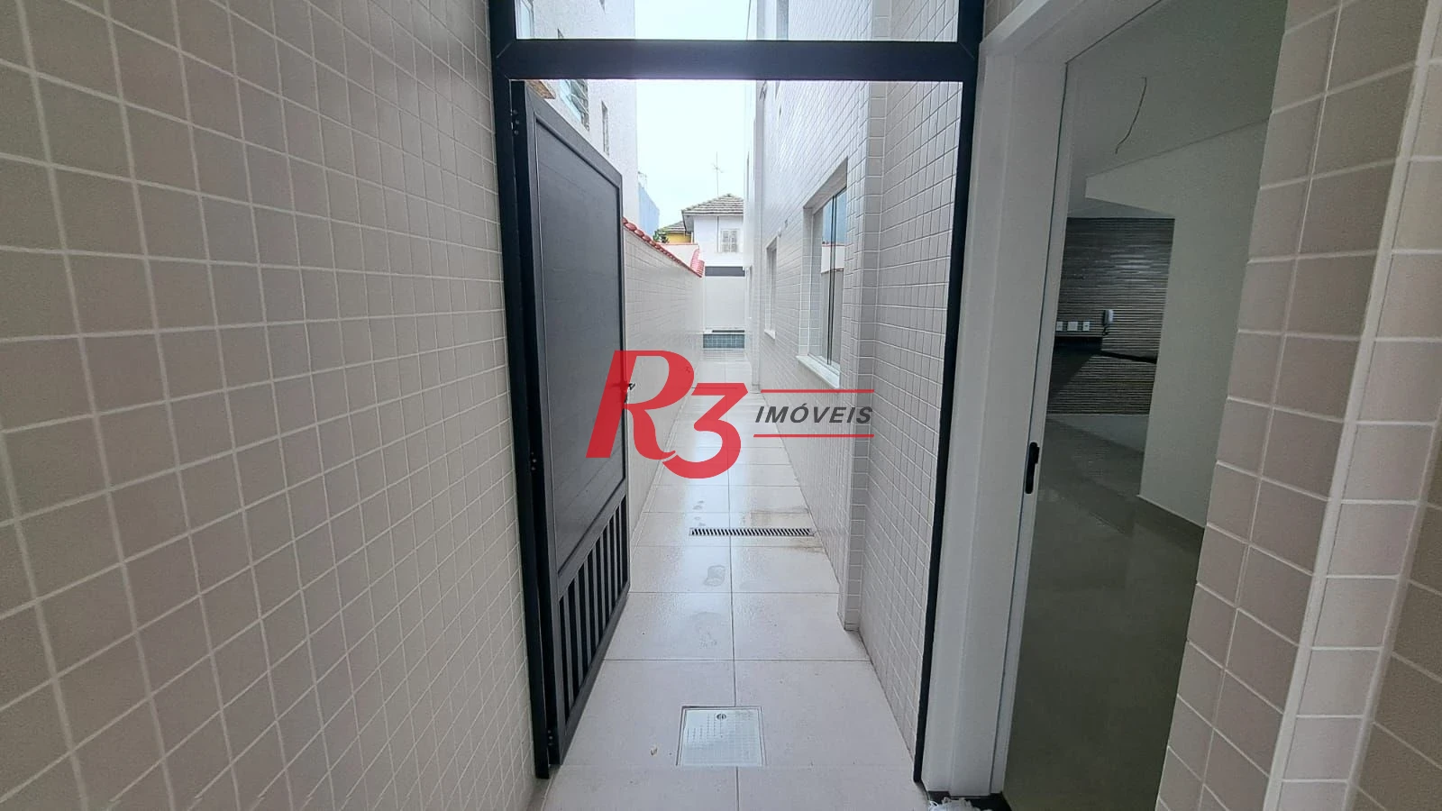 Casa com 3 dormitórios à venda, 139 m² por R$ 1.400.000,00 - Aparecida - Santos/SP