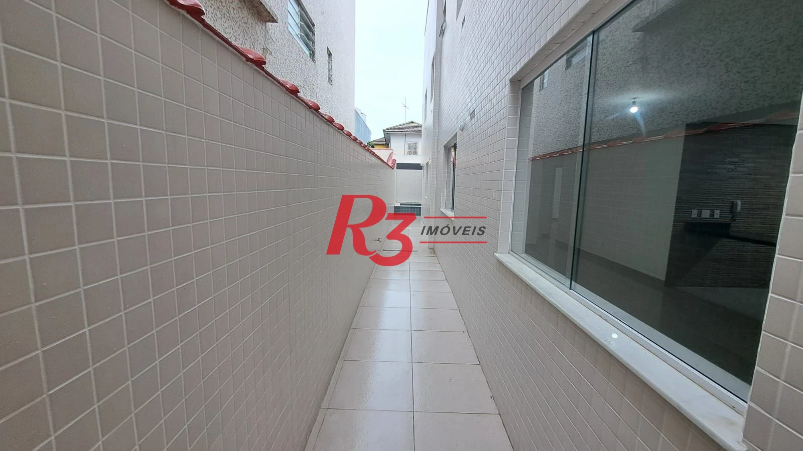 Casa com 3 dormitórios à venda, 139 m² por R$ 1.400.000,00 - Aparecida - Santos/SP