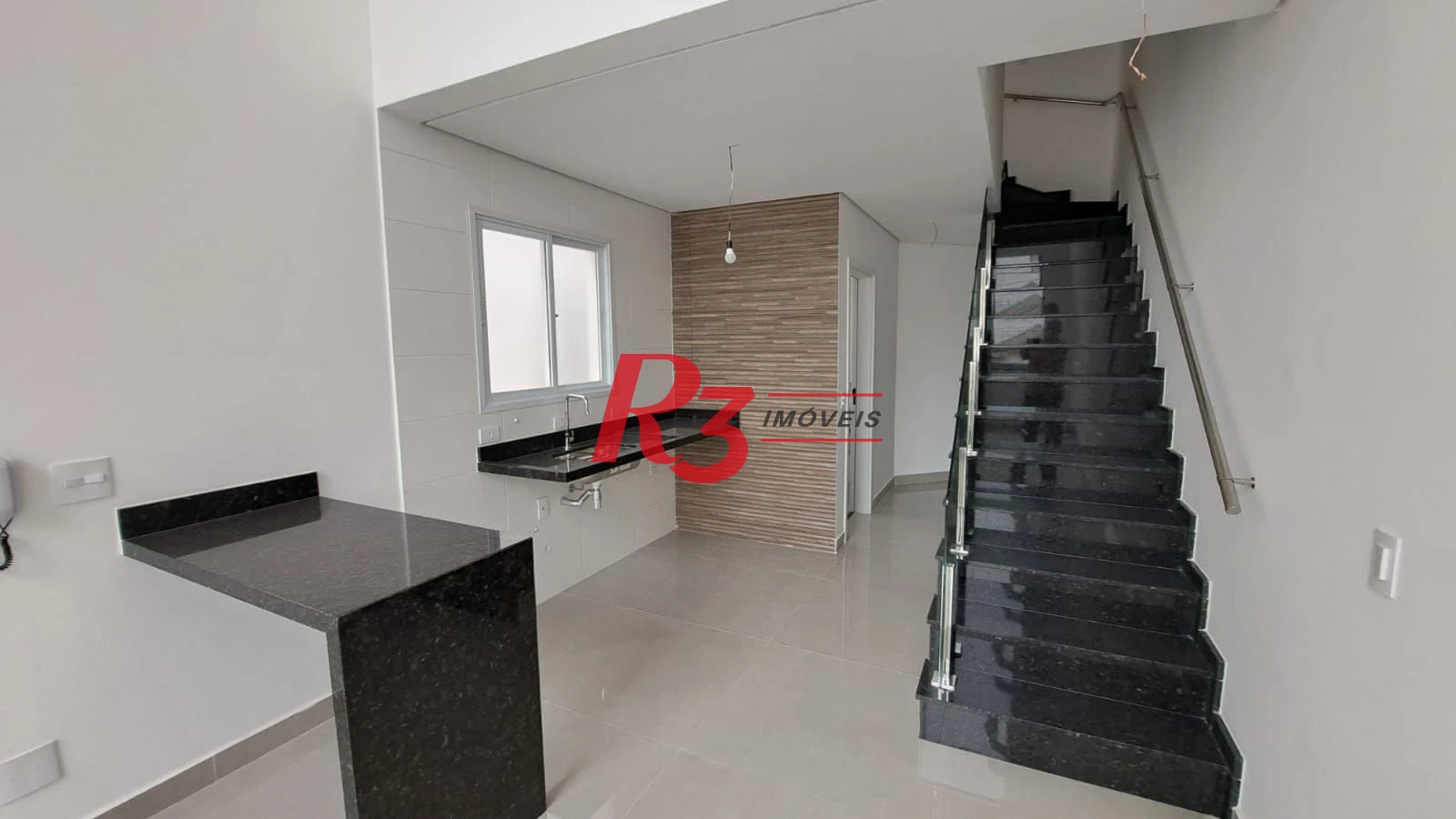 Casa com 3 dormitórios à venda, 151 m² por R$ 1.450.000,00 - Aparecida - Santos/SP