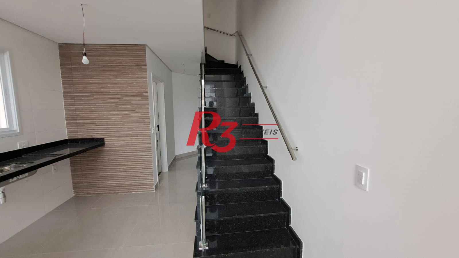 Casa com 3 dormitórios à venda, 151 m² por R$ 1.450.000,00 - Aparecida - Santos/SP