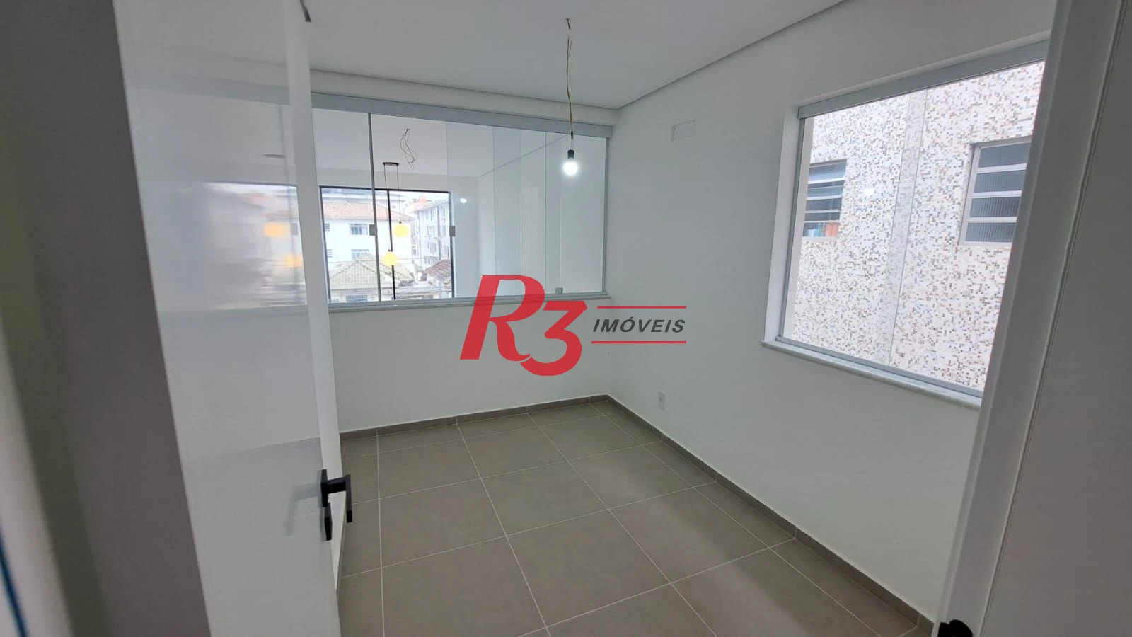 Casa com 3 dormitórios à venda, 151 m² por R$ 1.450.000,00 - Aparecida - Santos/SP
