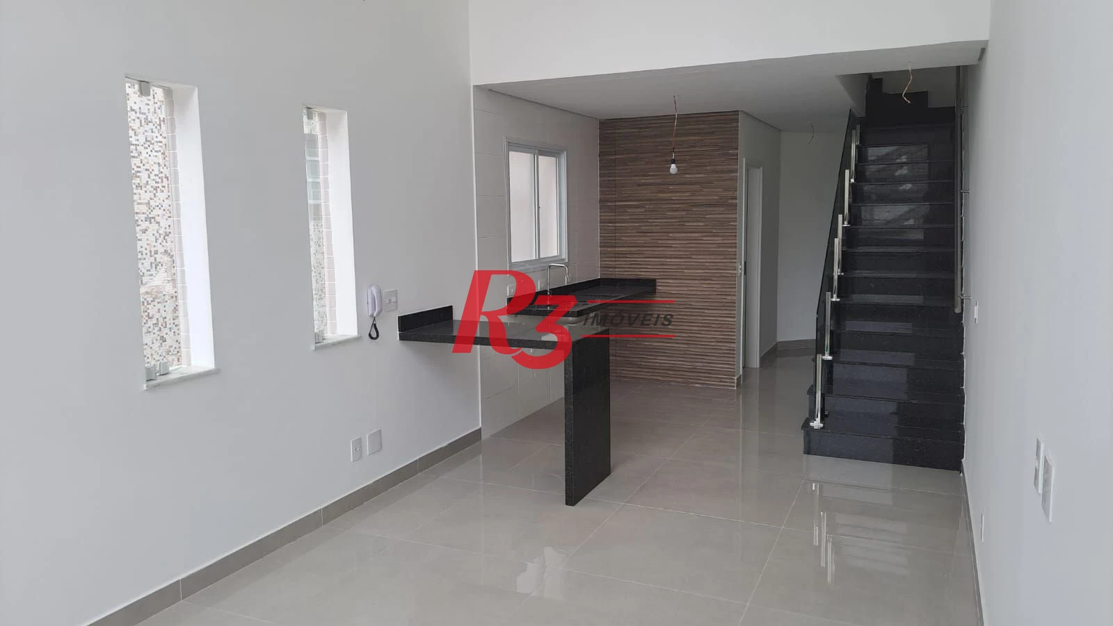 Casa com 3 dormitórios à venda, 151 m² por R$ 1.450.000,00 - Aparecida - Santos/SP