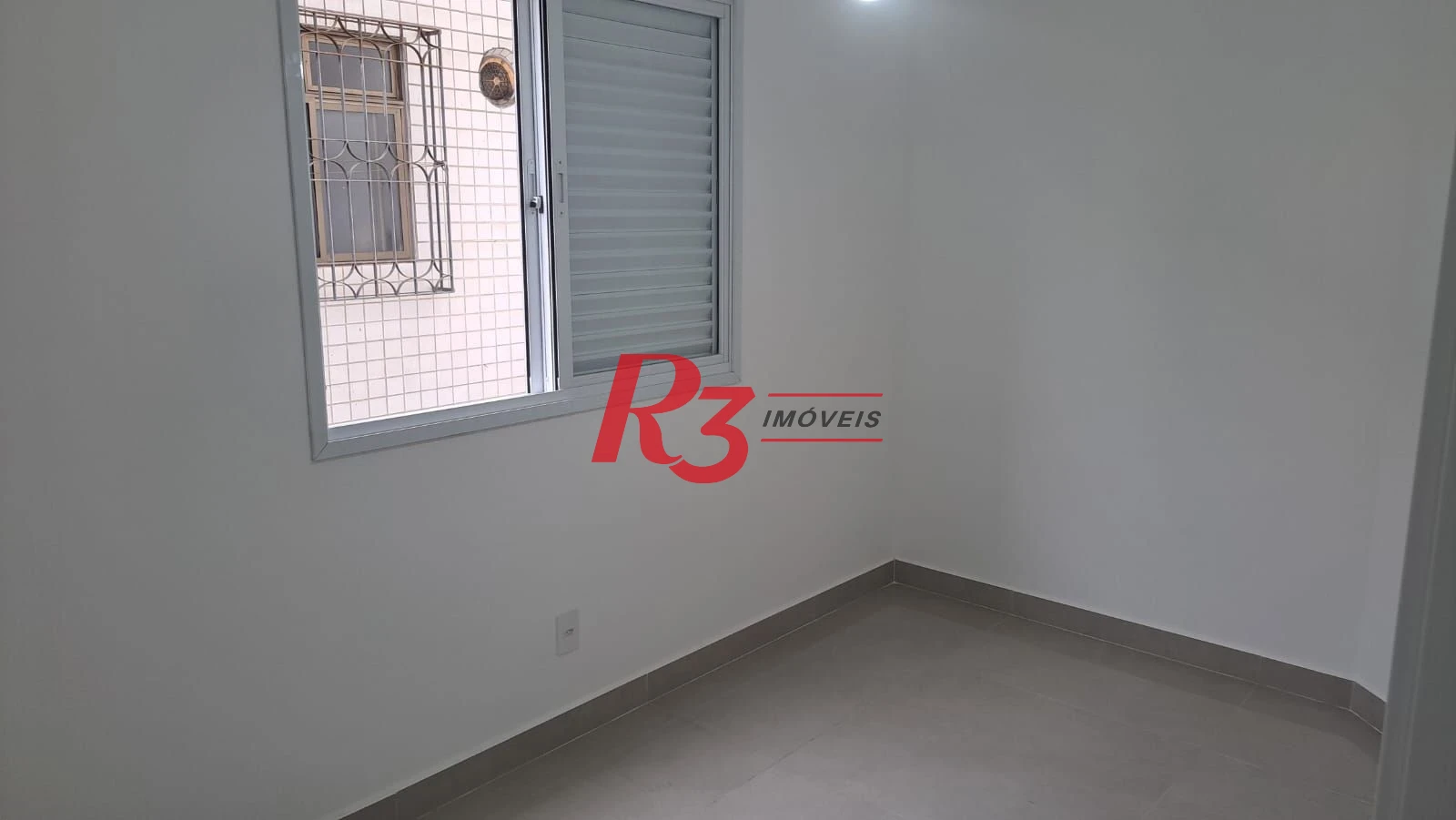 Casa com 3 dormitórios à venda, 152 m² por R$ 1.450.000,00 - Aparecida - Santos/SP