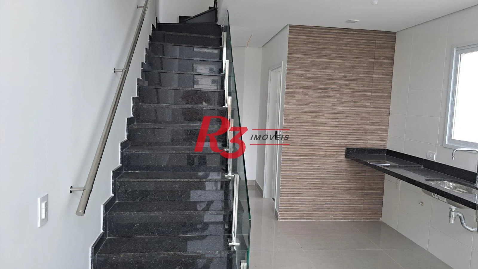 Casa com 3 dormitórios à venda, 152 m² por R$ 1.450.000,00 - Aparecida - Santos/SP