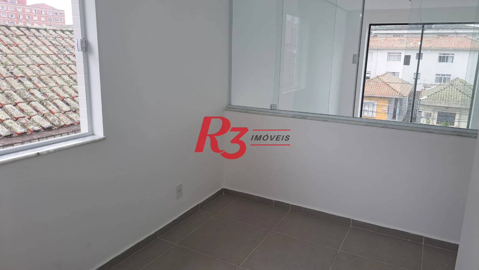 Casa com 3 dormitórios à venda, 152 m² por R$ 1.450.000,00 - Aparecida - Santos/SP
