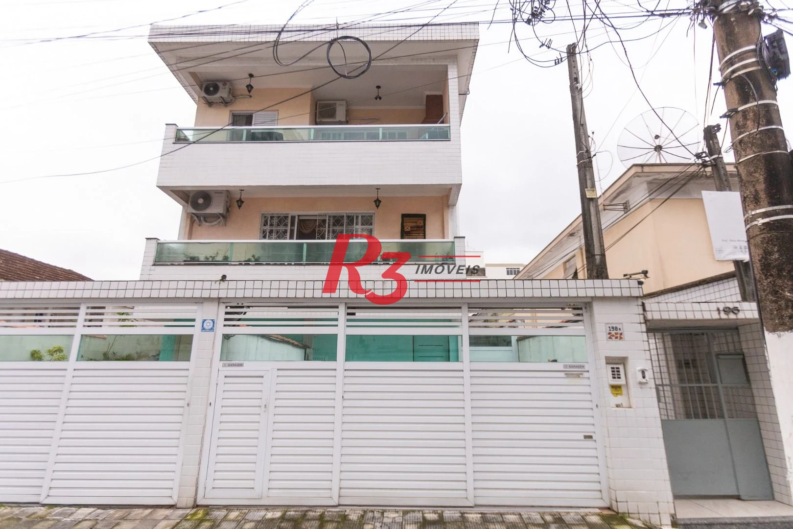 Casa com 3 dormitórios à venda, 200 m² por R$ 1.850.000,00 - Campo Grande - Santos/SP