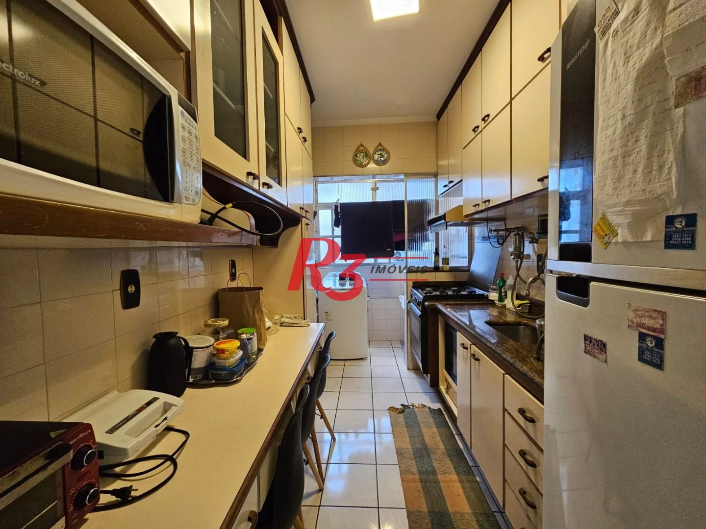 Apartamento com 2 dormitórios à venda, 56 m² por R$ 400.000,00 - José Menino - Santos/SP