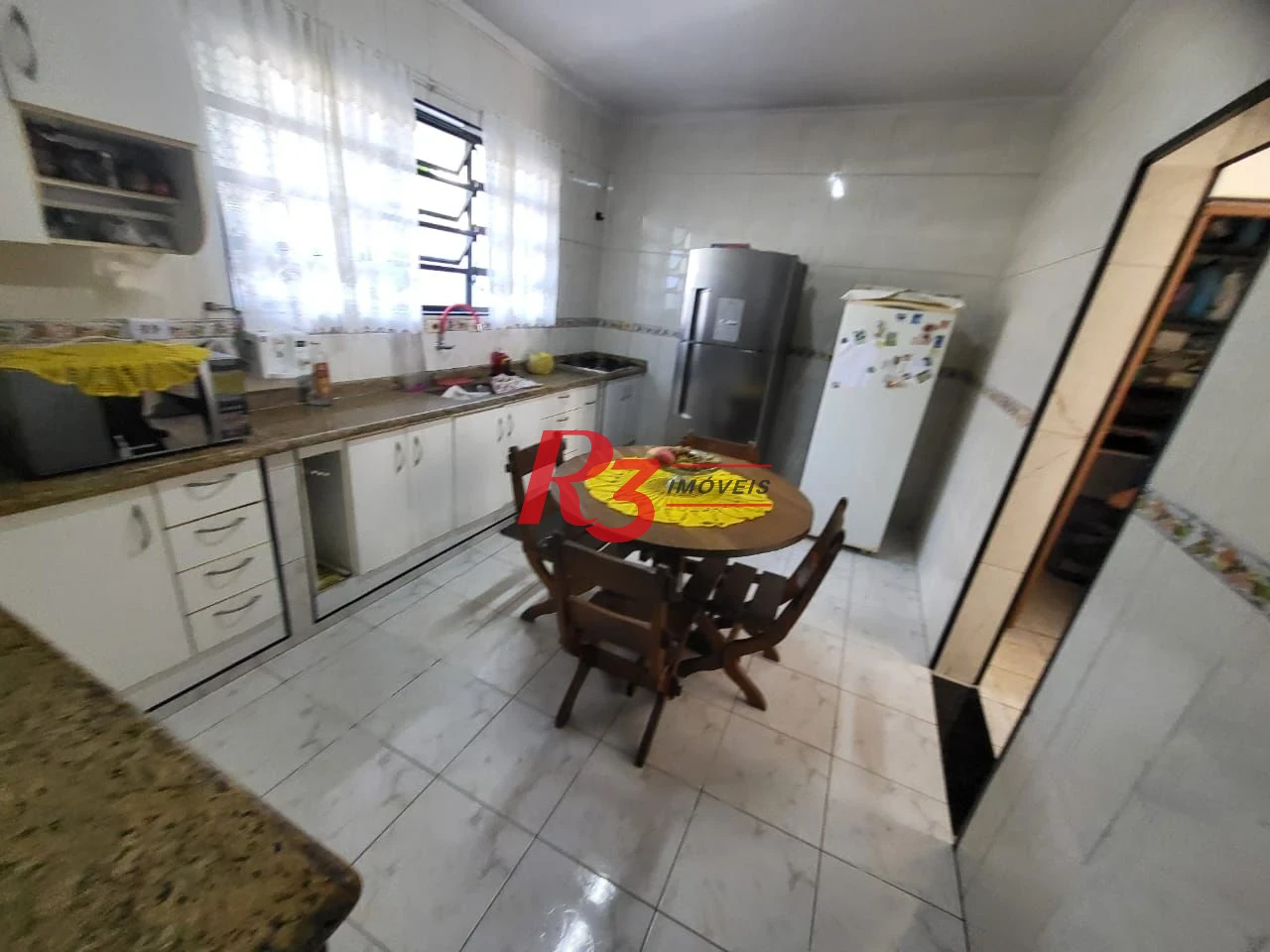 Sobrado com 4 dormitórios à venda, 166 m² por R$ 1.490.000,00 - Embaré - Santos/SP