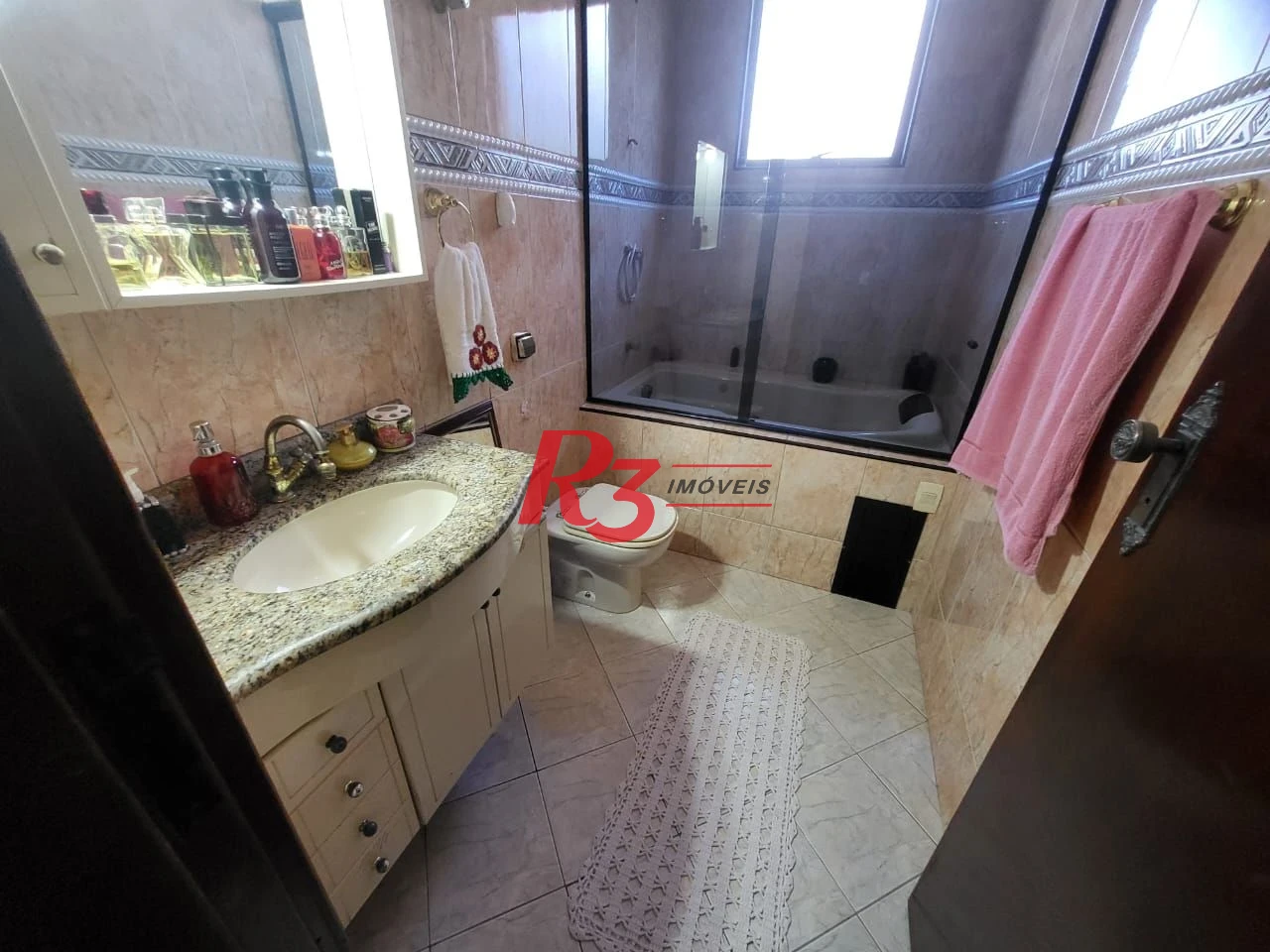 Sobrado com 4 dormitórios à venda, 166 m² por R$ 1.490.000,00 - Embaré - Santos/SP