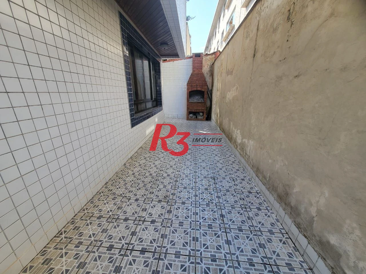 Sobrado com 4 dormitórios à venda, 166 m² por R$ 1.490.000,00 - Embaré - Santos/SP