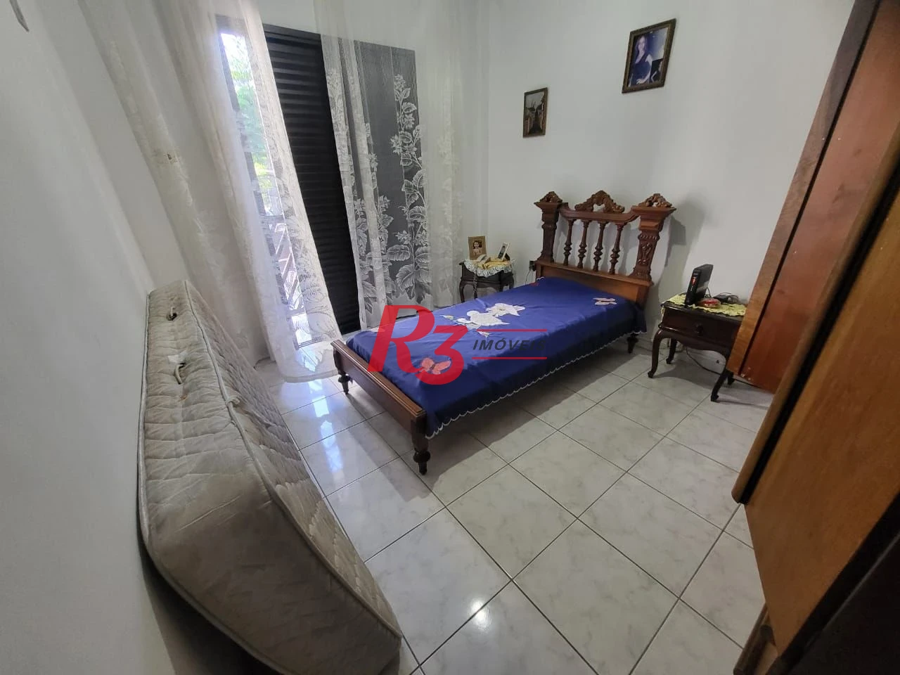 Sobrado com 4 dormitórios à venda, 166 m² por R$ 1.490.000,00 - Embaré - Santos/SP