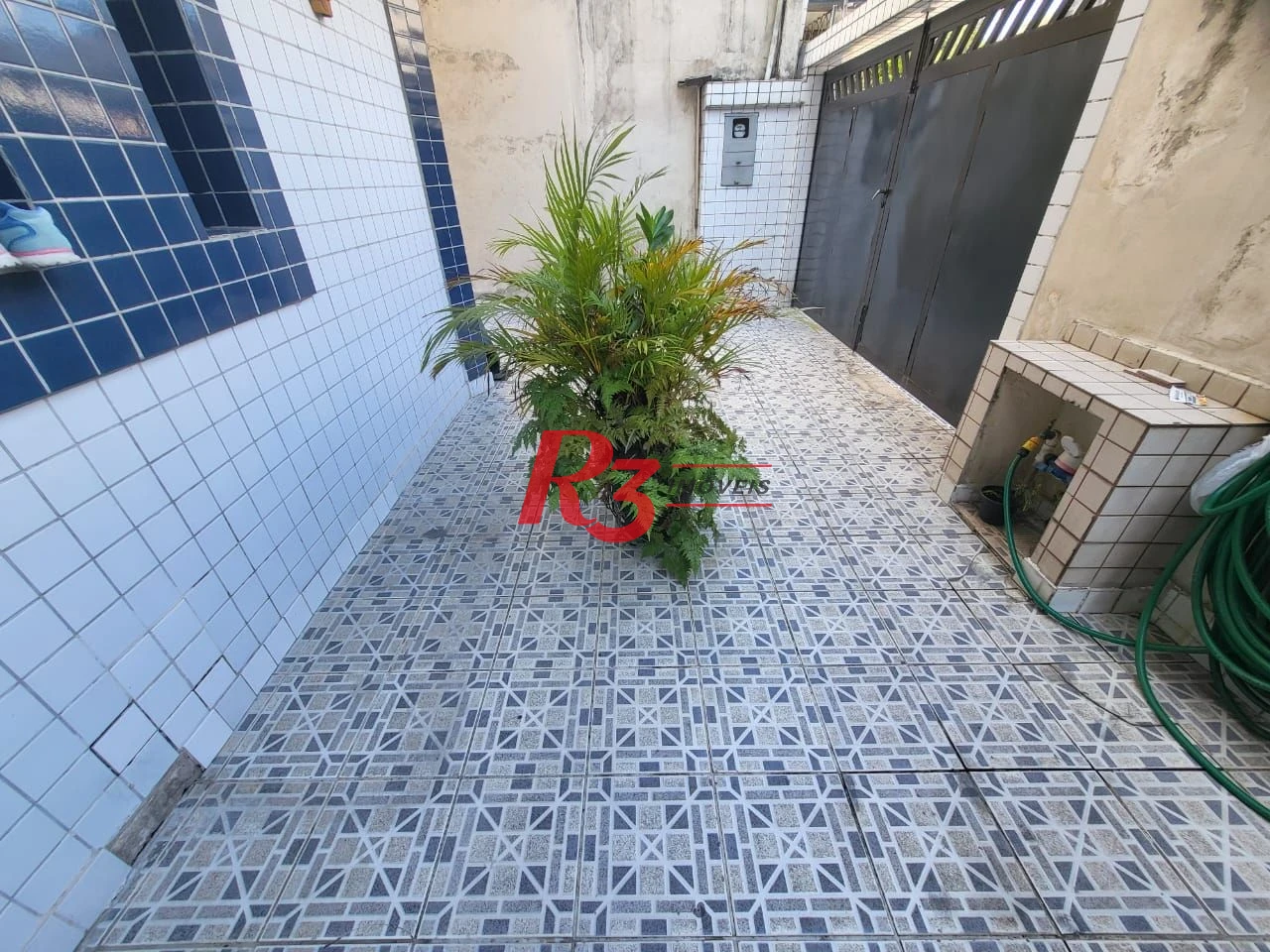 Sobrado com 4 dormitórios à venda, 166 m² por R$ 1.490.000,00 - Embaré - Santos/SP