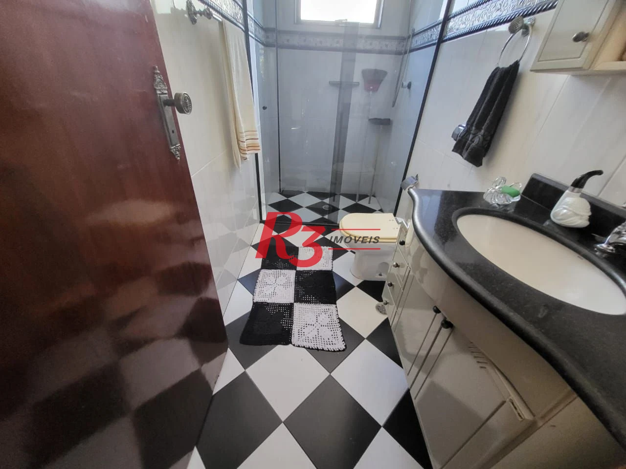 Sobrado com 4 dormitórios à venda, 166 m² por R$ 1.490.000,00 - Embaré - Santos/SP
