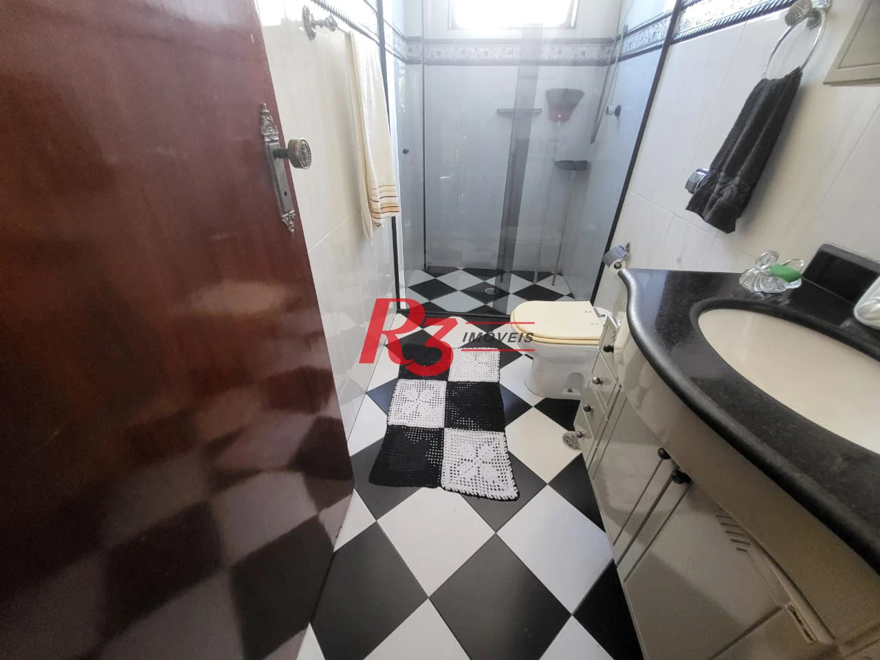 Sobrado com 4 dormitórios à venda, 166 m² por R$ 1.490.000,00 - Embaré - Santos/SP