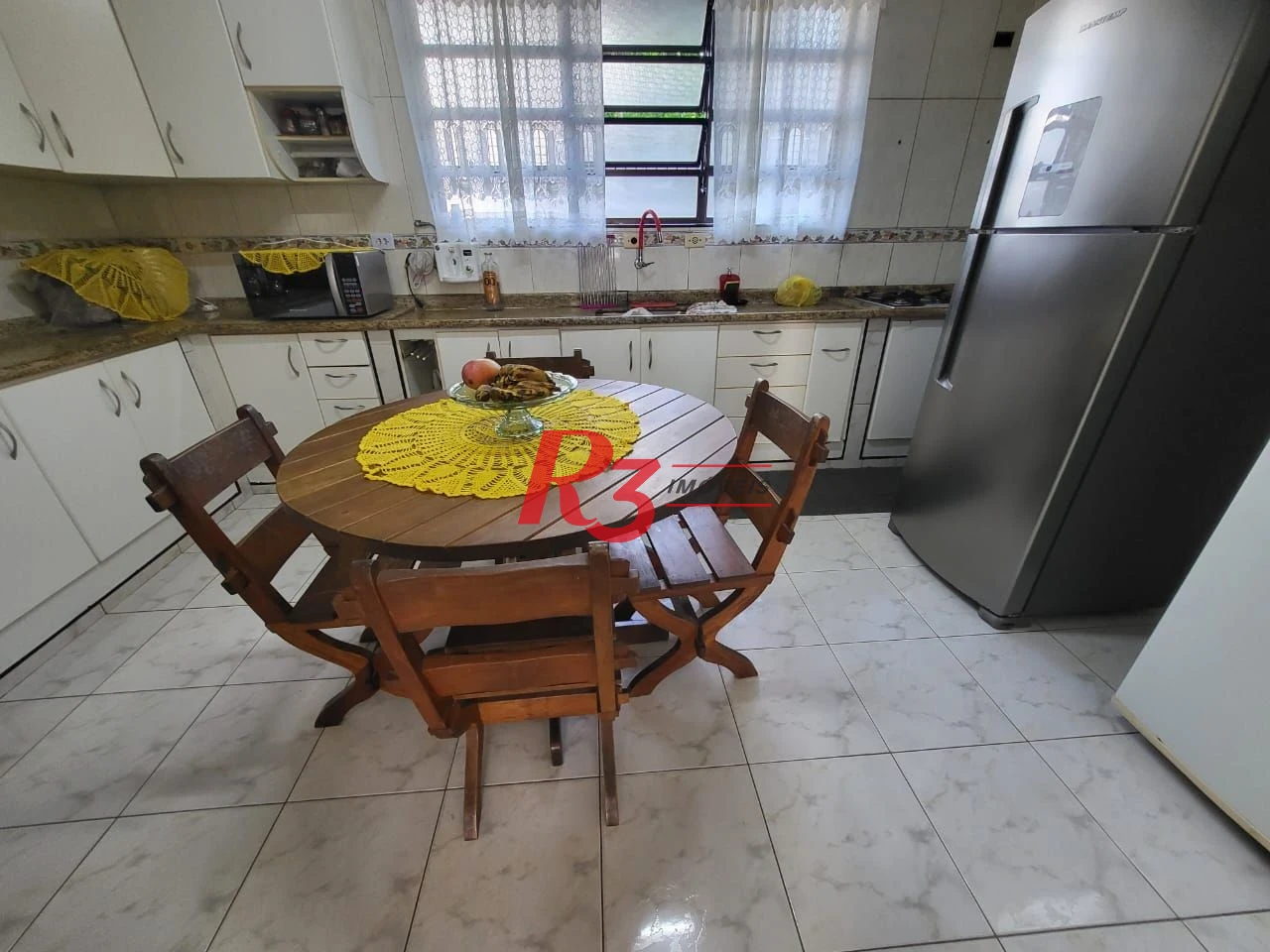Sobrado com 4 dormitórios à venda, 166 m² por R$ 1.490.000,00 - Embaré - Santos/SP