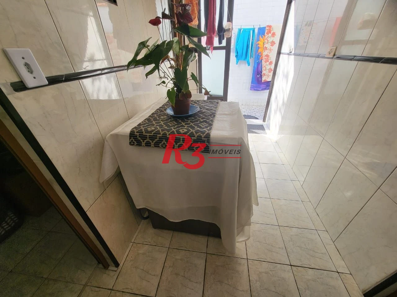 Sobrado com 4 dormitórios à venda, 166 m² por R$ 1.490.000,00 - Embaré - Santos/SP