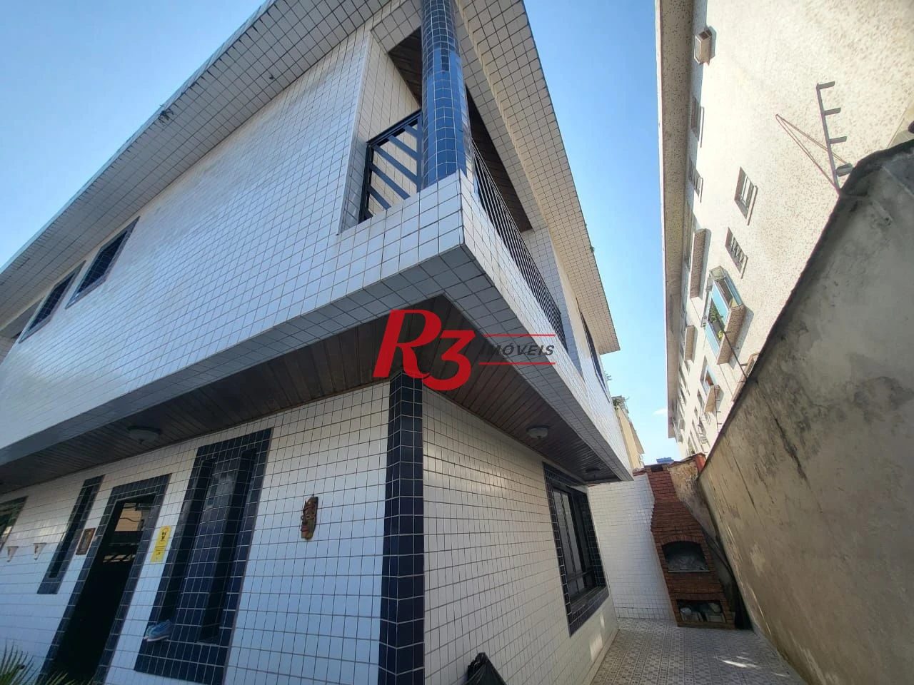 Sobrado com 4 dormitórios à venda, 166 m² por R$ 1.490.000,00 - Embaré - Santos/SP