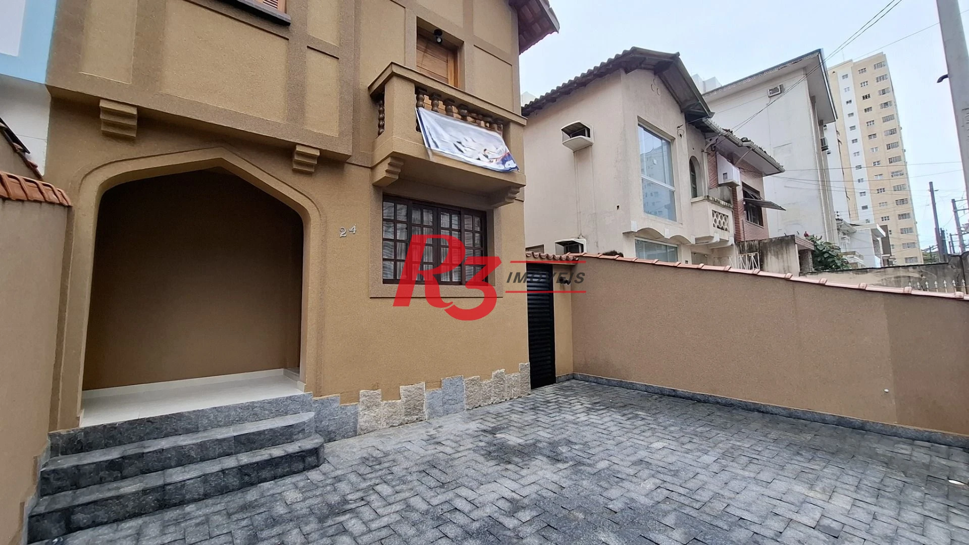 Sobrado com 3 dormitórios para alugar, 110 m² por R$ 6.795,00/mês - Embaré - Santos/SP