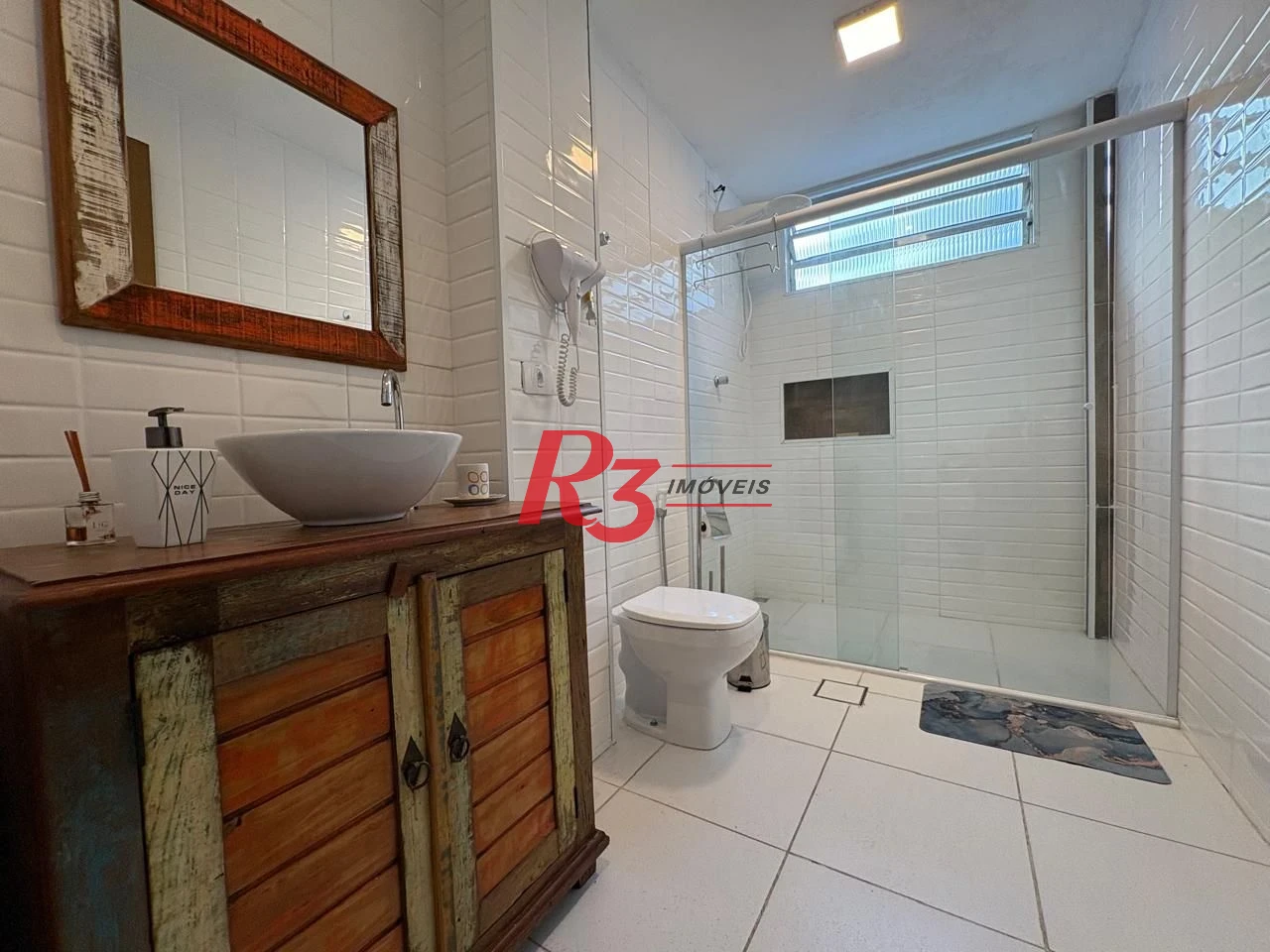 Apartamento com 1 dormitório para alugar, 60 m² por R$ 4.500,02/mês - Boqueirão - Santos/SP