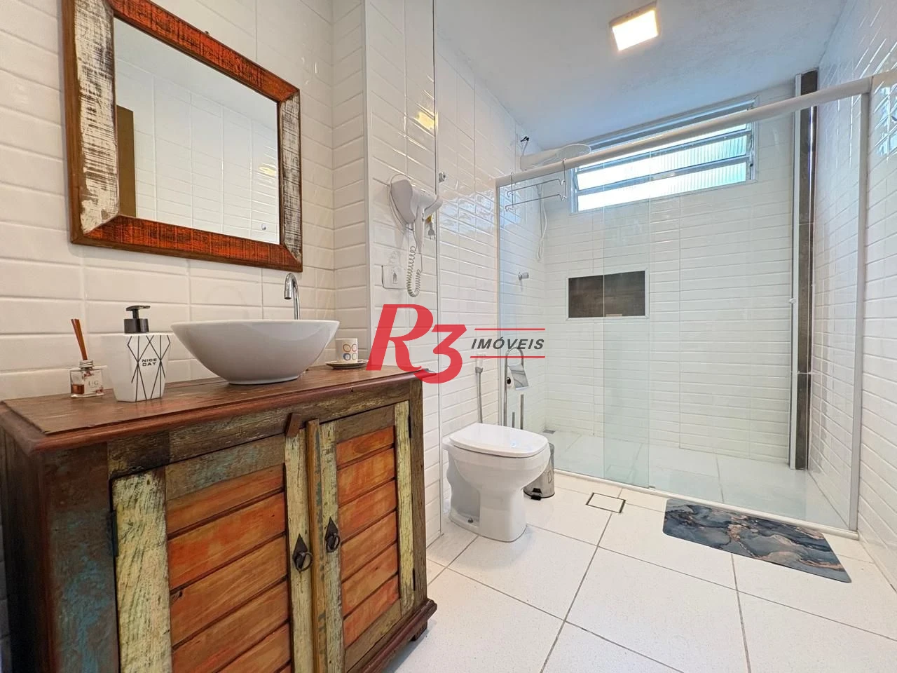 Apartamento com 1 dormitório para alugar, 60 m² por R$ 4.500,02/mês - Boqueirão - Santos/SP
