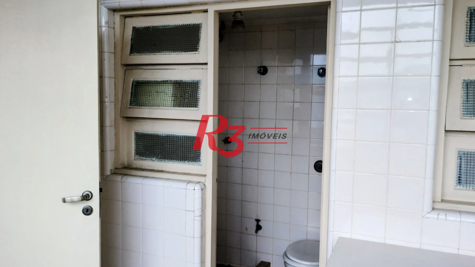 Apartamento com 3 dormitórios à venda, 235 m² por R$ 1.800.000,00 - Ilha Porchat - São Vicente/SP