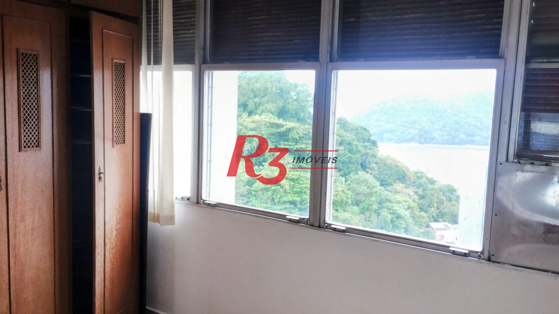 Apartamento com 3 dormitórios à venda, 235 m² por R$ 1.800.000,00 - Ilha Porchat - São Vicente/SP