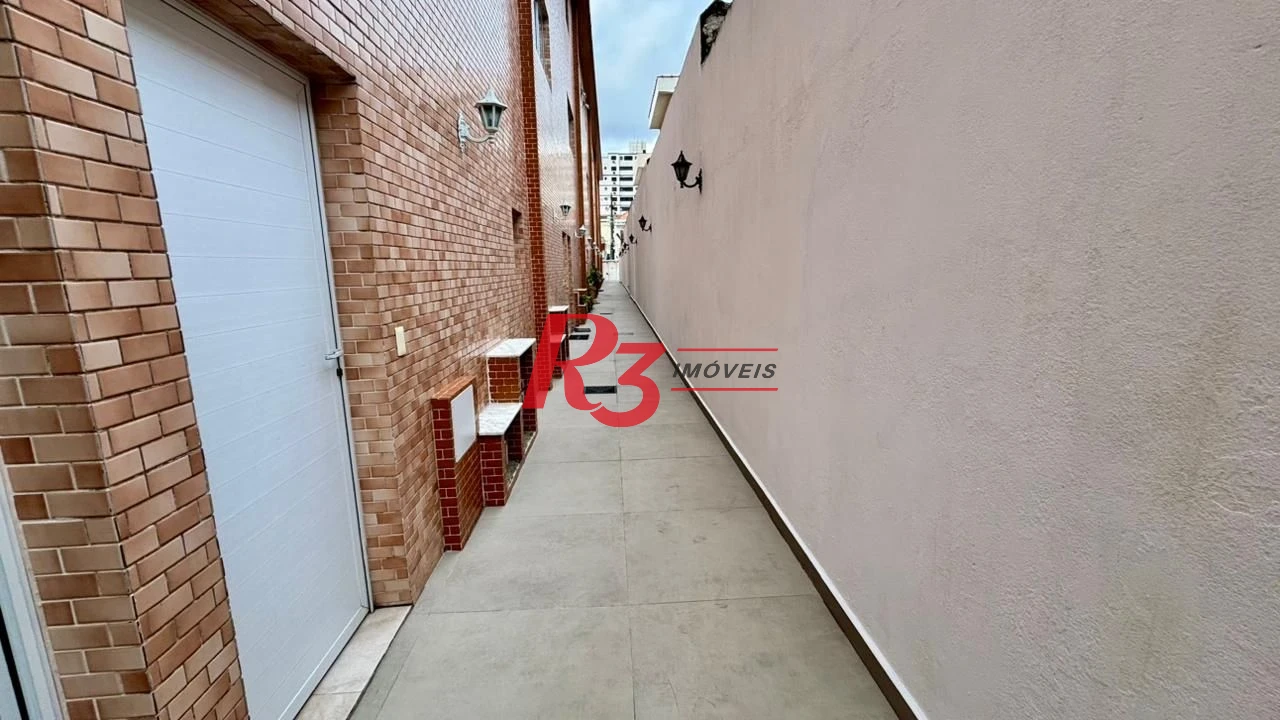 Village com lazer com 2 dormitórios à venda, 106 m² por R$ 585.000 - Vila Mathias - Santos/SP