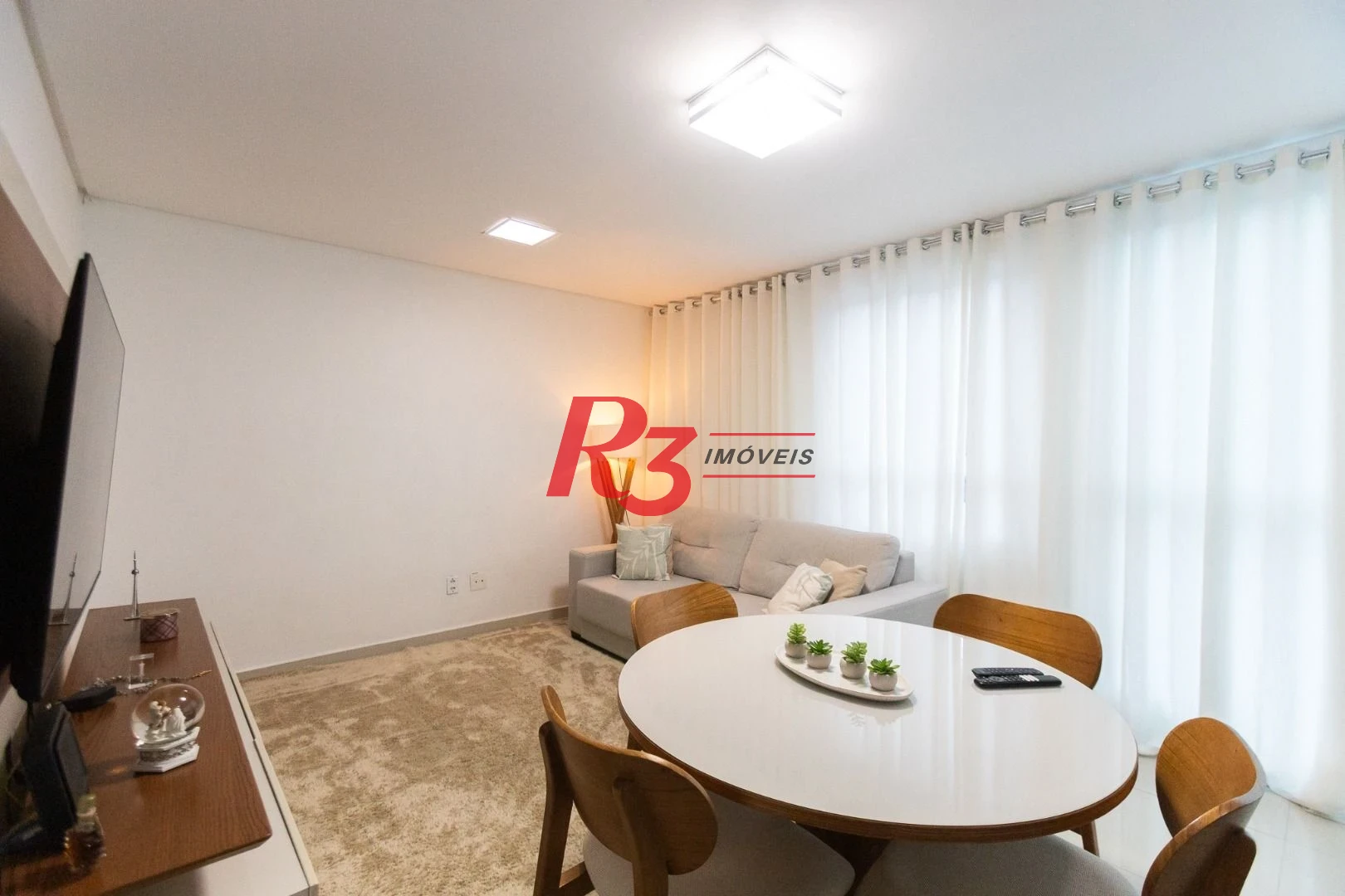 Casa com 3 dormitórios à venda, 123 m² por R$ 720.000,00 - Macuco - Santos/SP