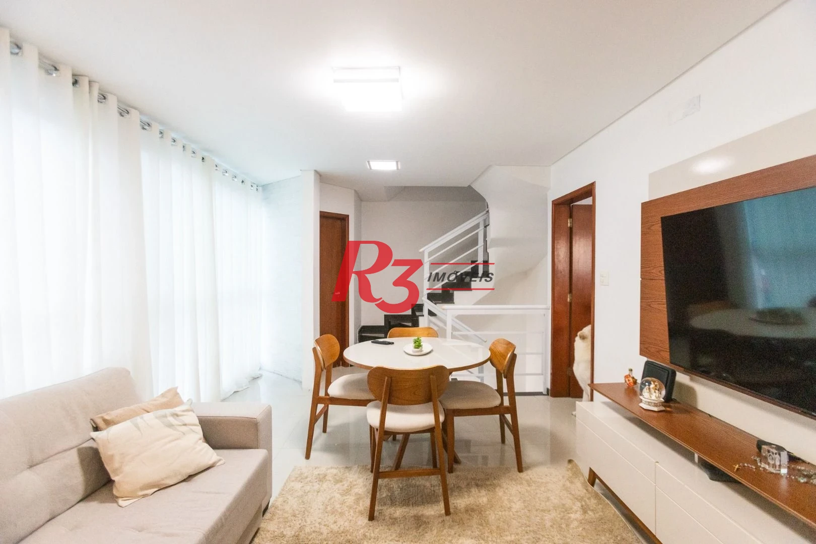 Casa com 3 dormitórios à venda, 123 m² por R$ 720.000,00 - Macuco - Santos/SP