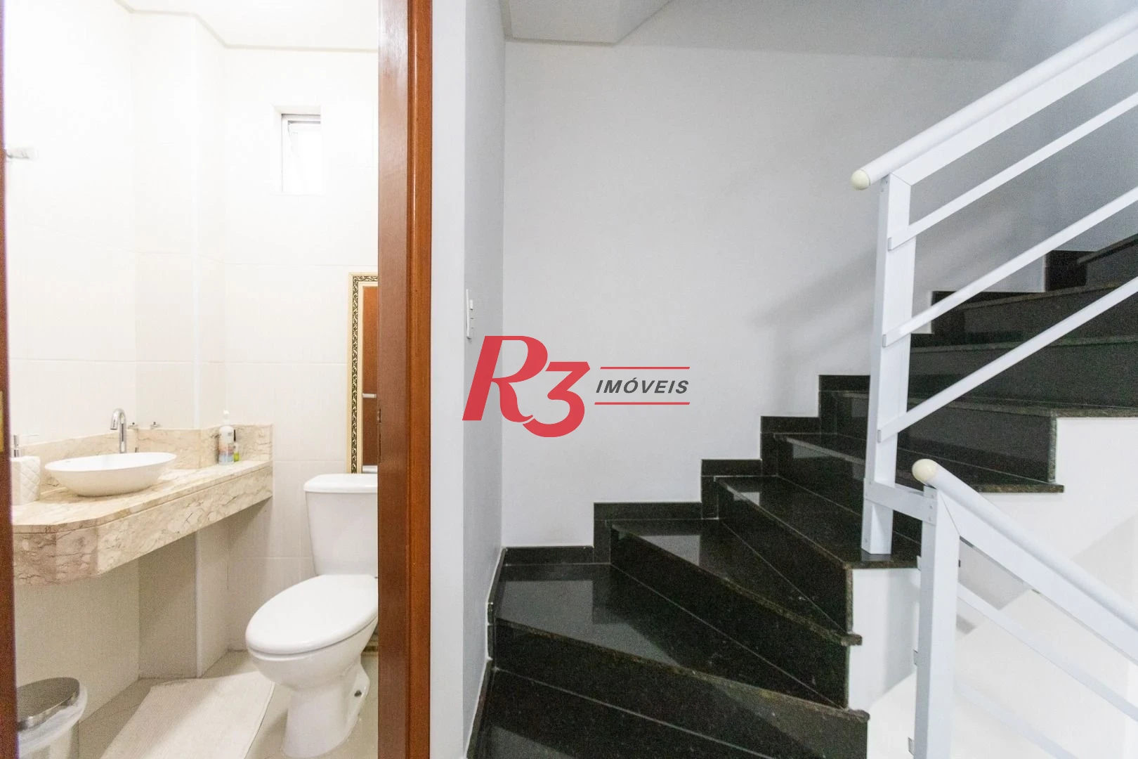 Casa com 3 dormitórios à venda, 123 m² por R$ 720.000,00 - Macuco - Santos/SP