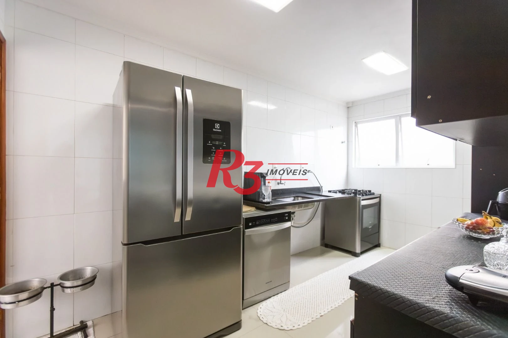 Casa com 3 dormitórios à venda, 123 m² por R$ 720.000,00 - Macuco - Santos/SP