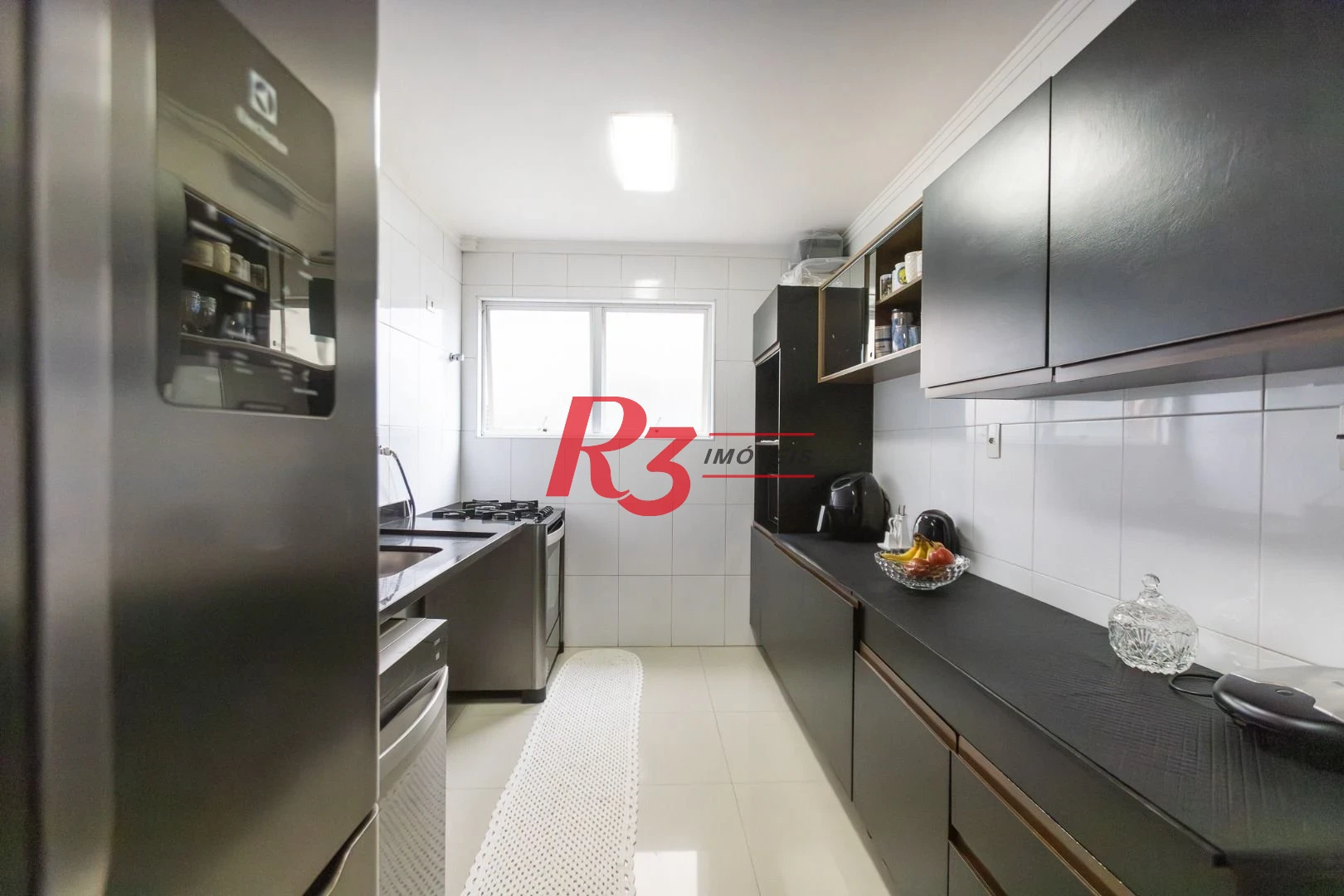 Casa com 3 dormitórios à venda, 123 m² por R$ 720.000,00 - Macuco - Santos/SP
