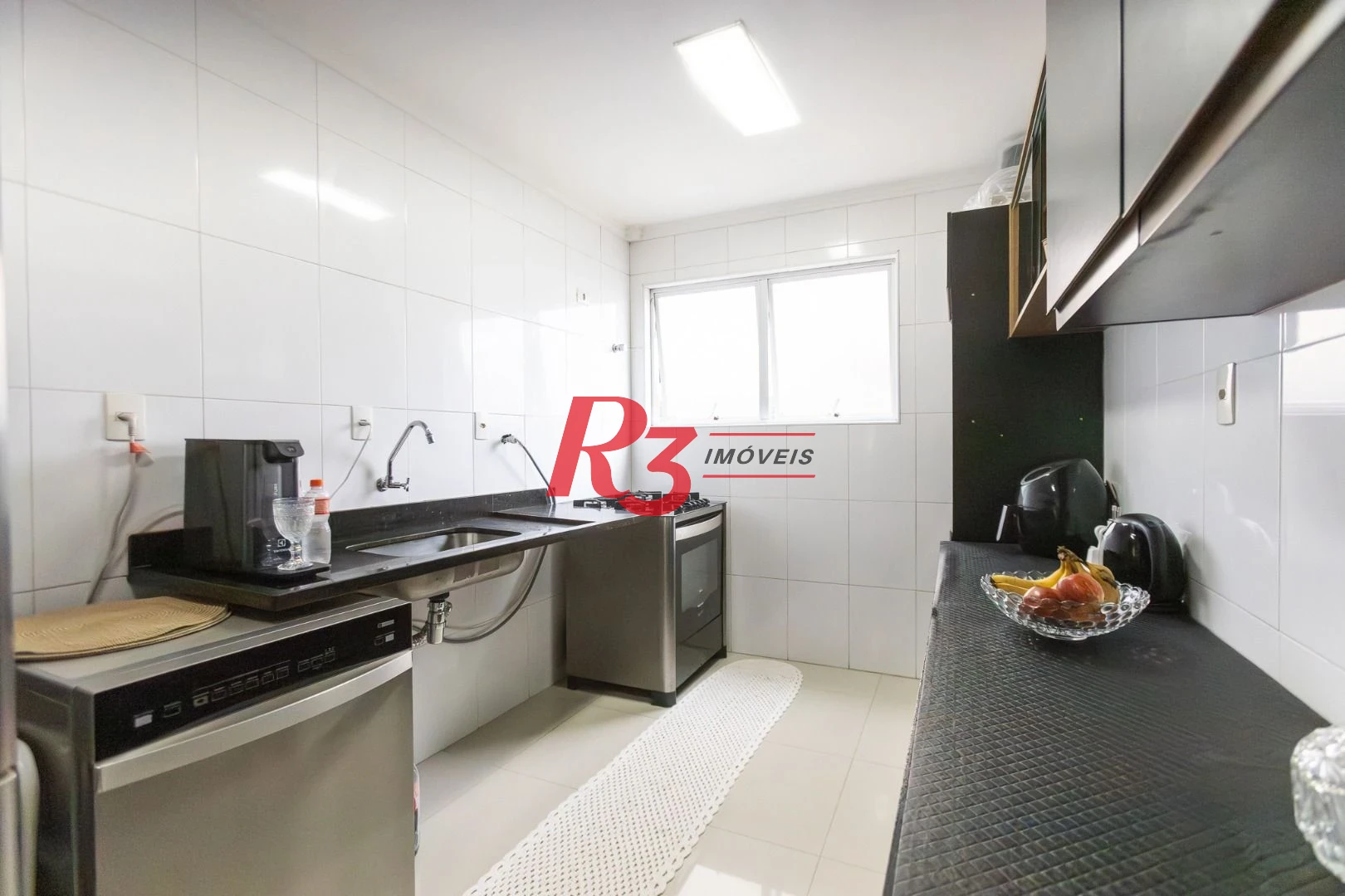 Casa com 3 dormitórios à venda, 123 m² por R$ 720.000,00 - Macuco - Santos/SP