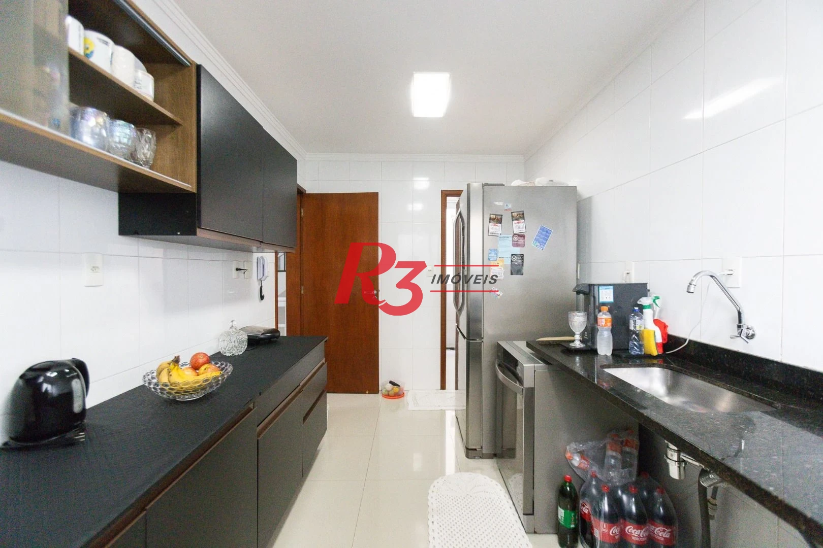 Casa com 3 dormitórios à venda, 123 m² por R$ 720.000,00 - Macuco - Santos/SP