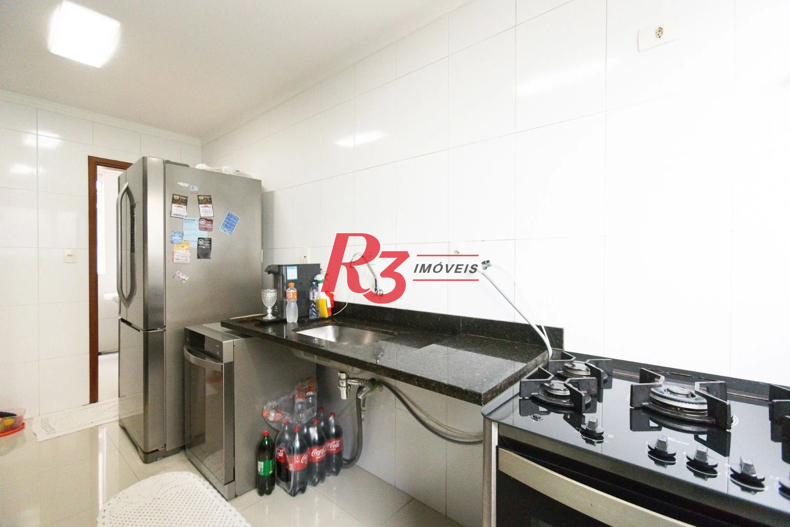 Casa com 3 dormitórios à venda, 123 m² por R$ 720.000,00 - Macuco - Santos/SP