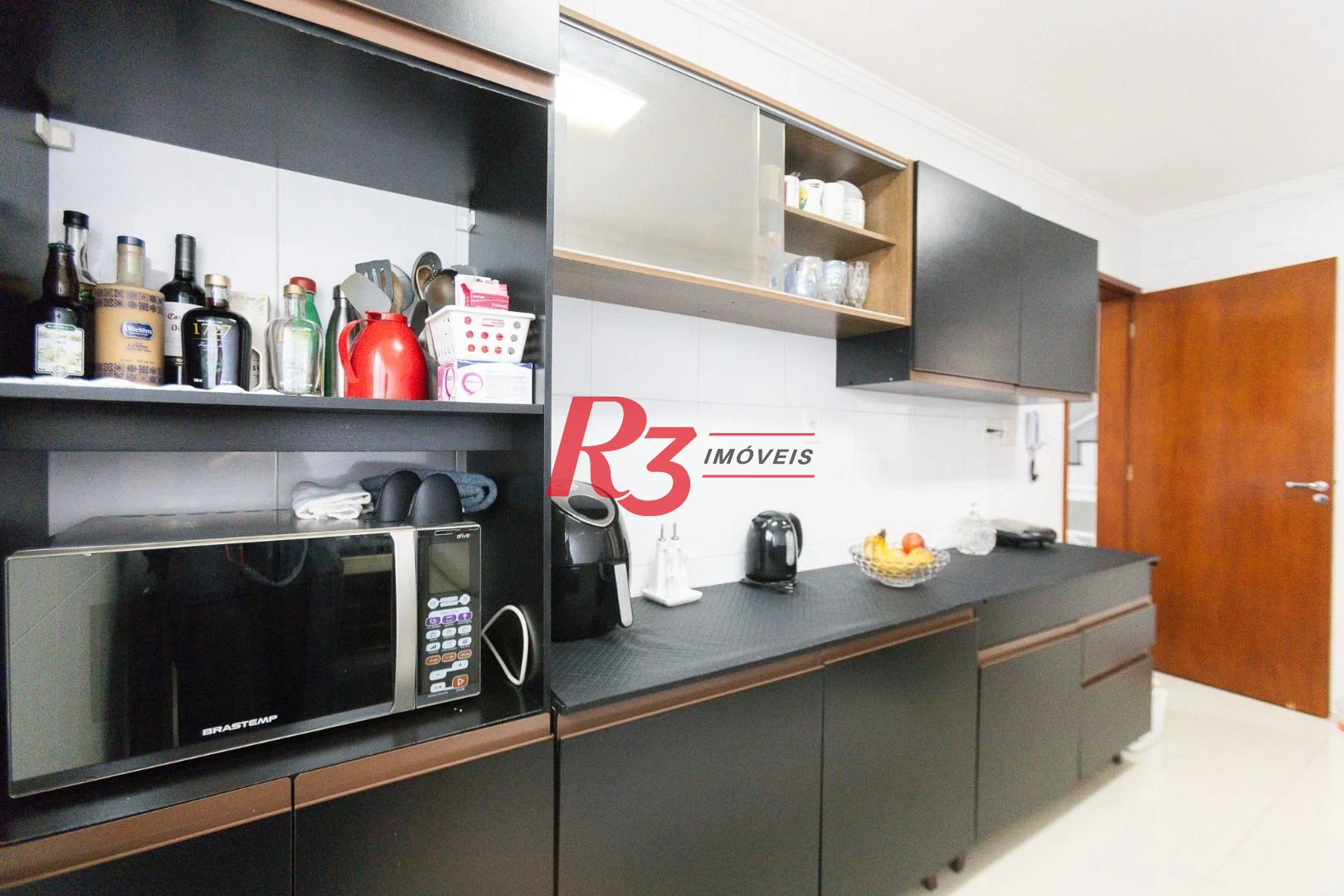 Casa com 3 dormitórios à venda, 123 m² por R$ 720.000,00 - Macuco - Santos/SP