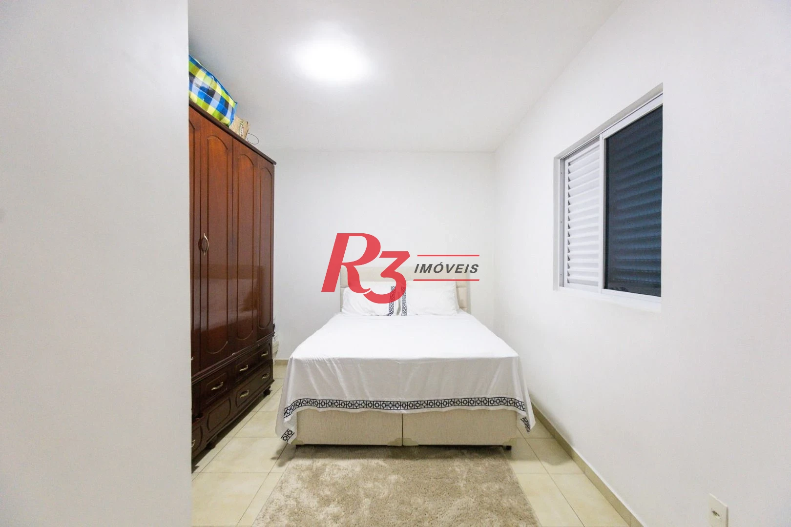 Casa com 3 dormitórios à venda, 123 m² por R$ 720.000,00 - Macuco - Santos/SP