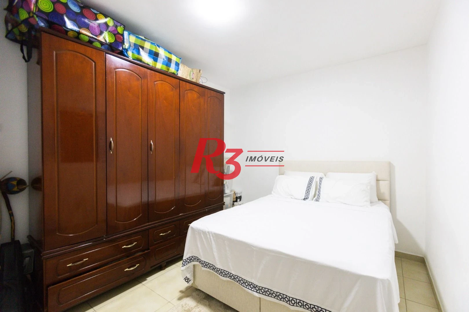 Casa com 3 dormitórios à venda, 123 m² por R$ 720.000,00 - Macuco - Santos/SP