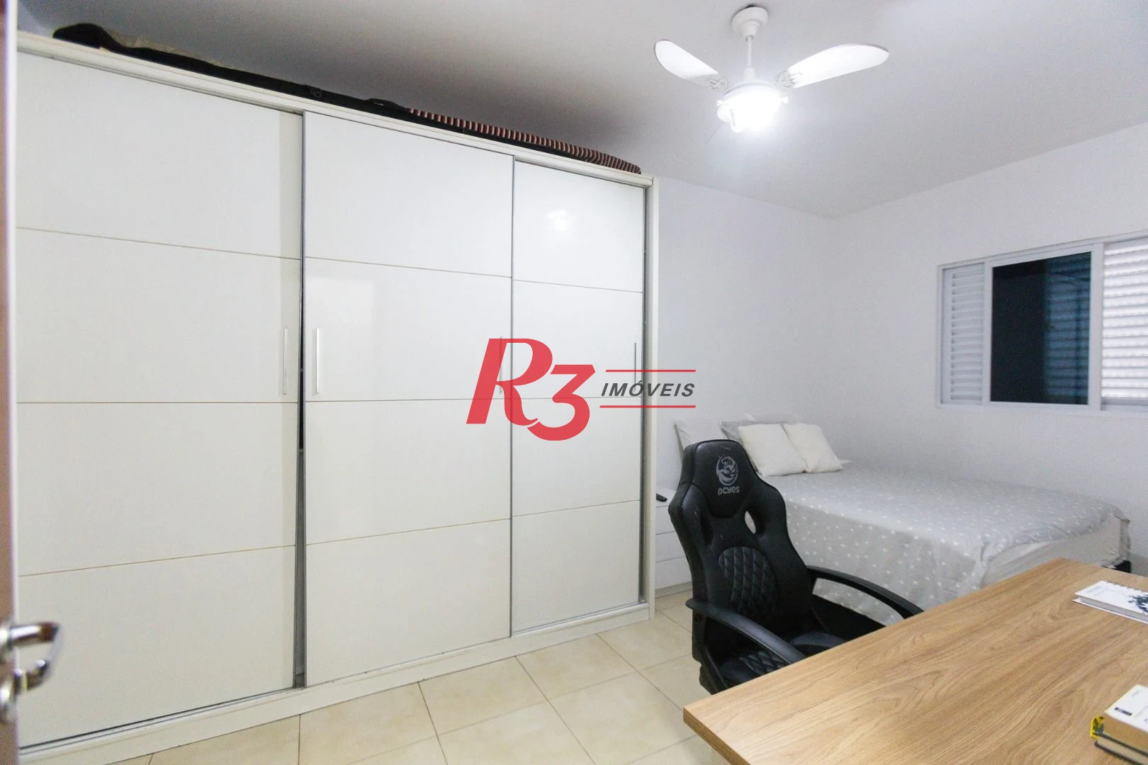 Casa com 3 dormitórios à venda, 123 m² por R$ 720.000,00 - Macuco - Santos/SP