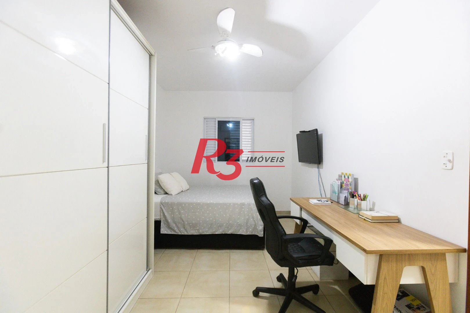 Casa com 3 dormitórios à venda, 123 m² por R$ 720.000,00 - Macuco - Santos/SP